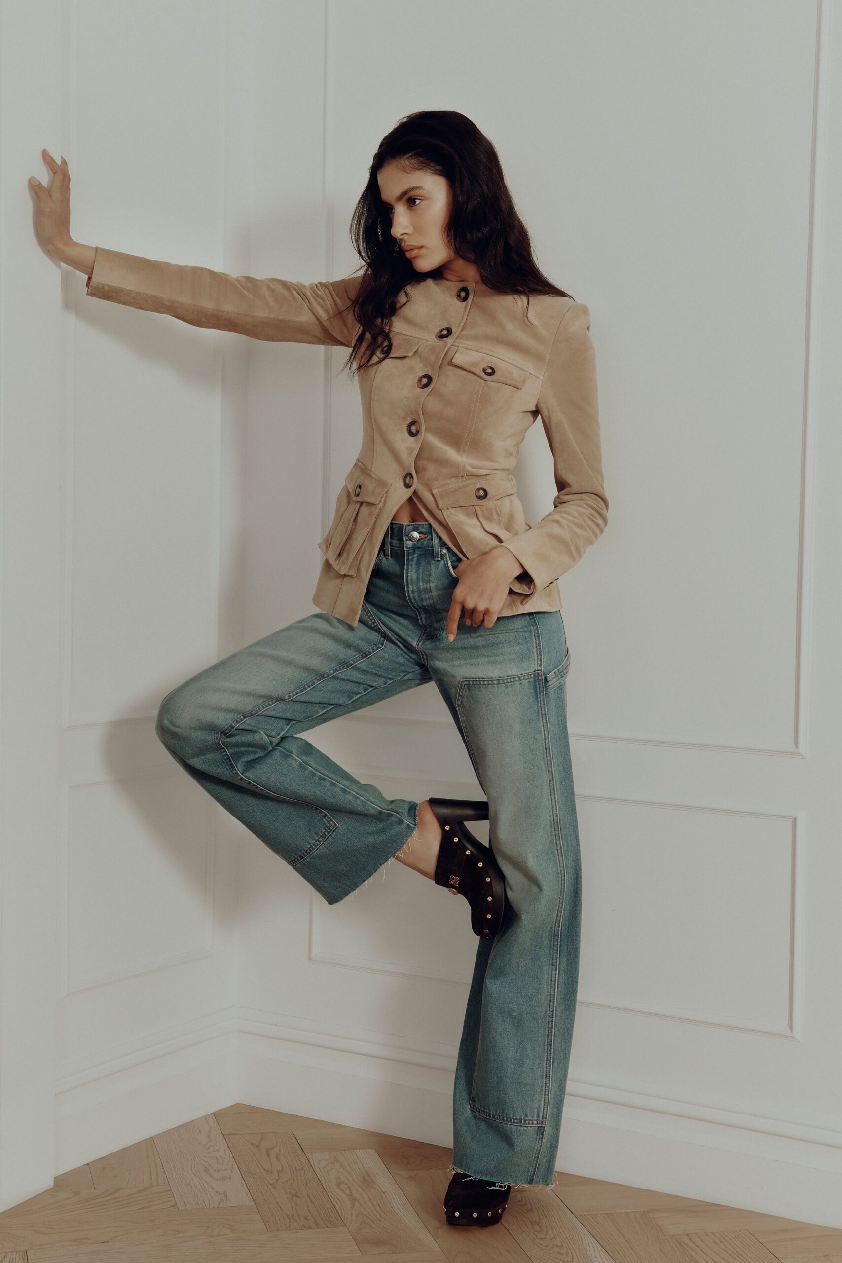 beige velvet fitted jacket with flared jeans