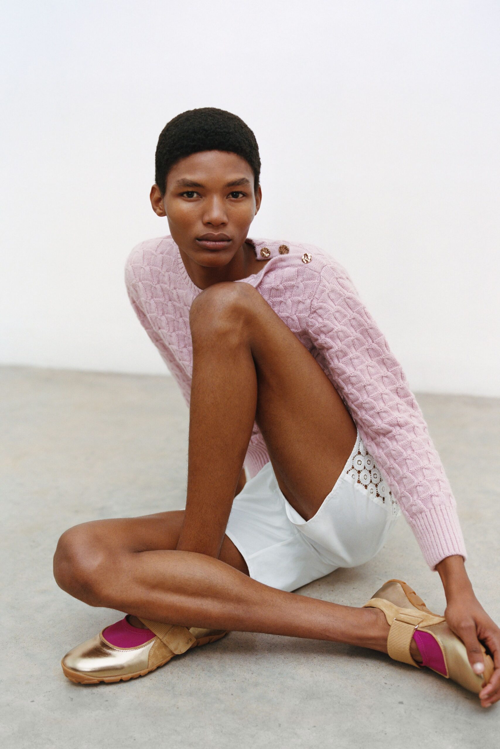 pink cotton long-sleeve collared fitted textured sweater