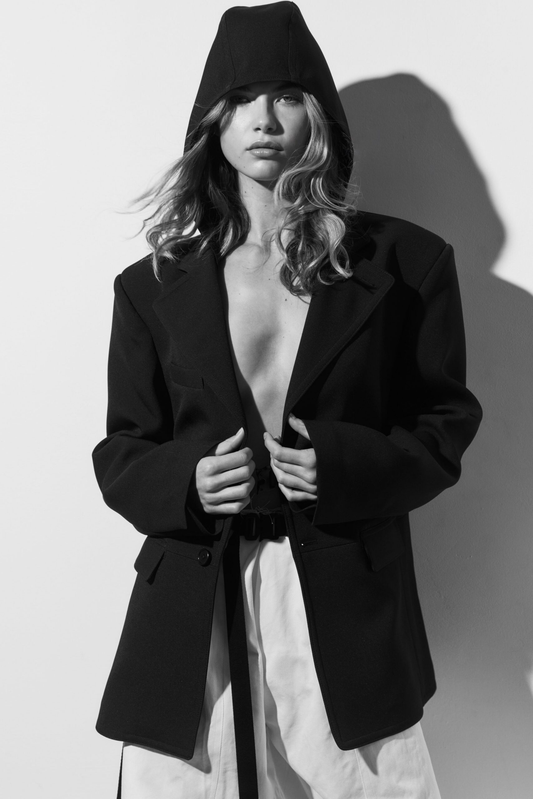 black wool long-sleeve hooded oversized buttoned jacket