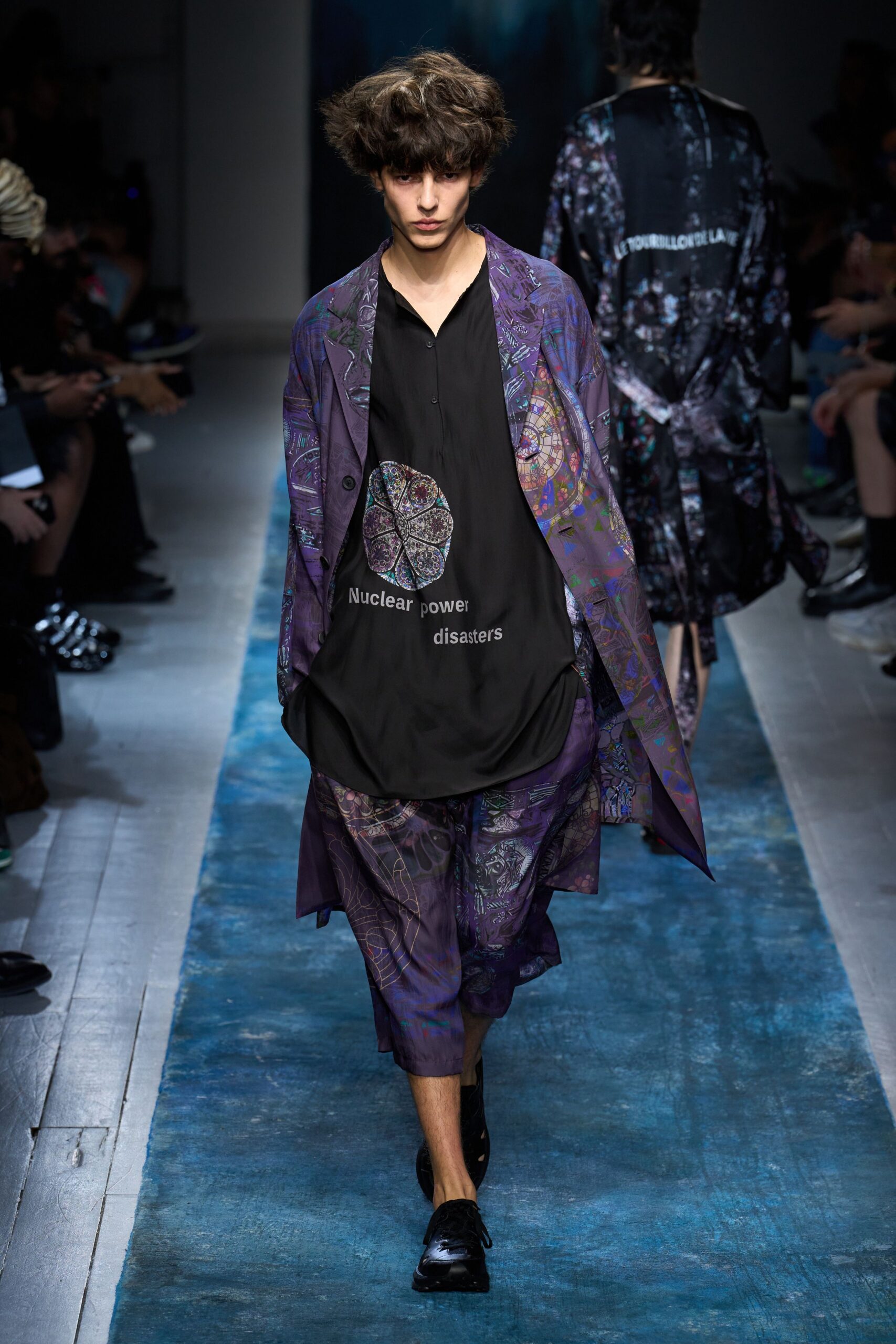 purple printed coat with black shirt
