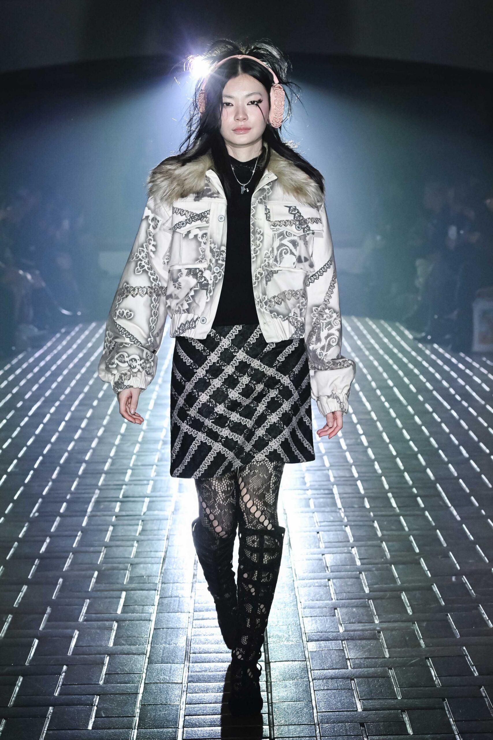 white embroidered jacket with black top
