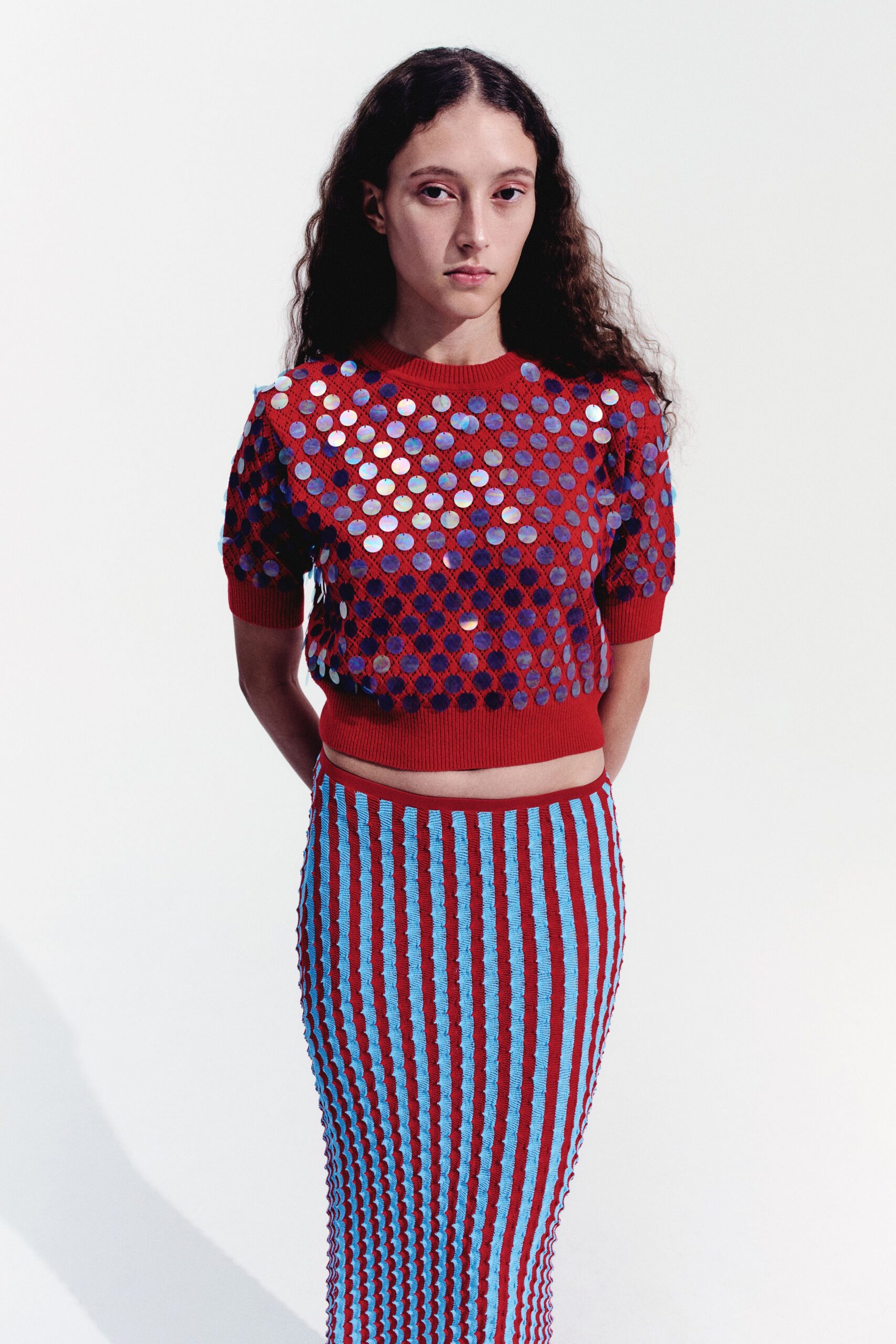 red knit short-sleeve collared fitted embellished top