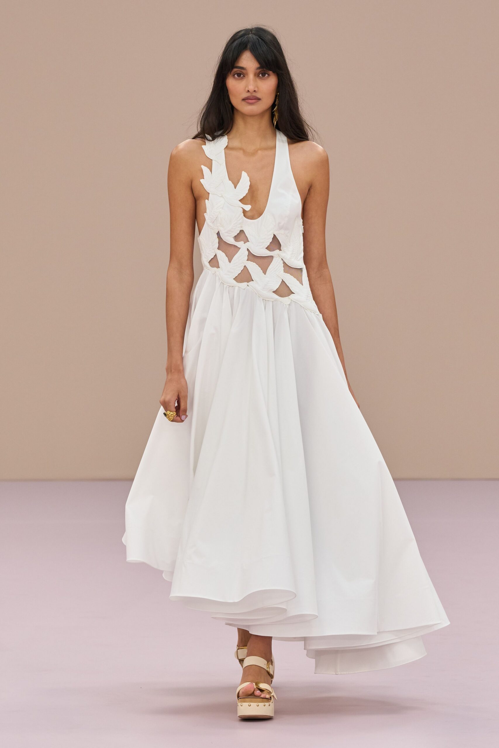 white sleeveless midi dress with cutouts