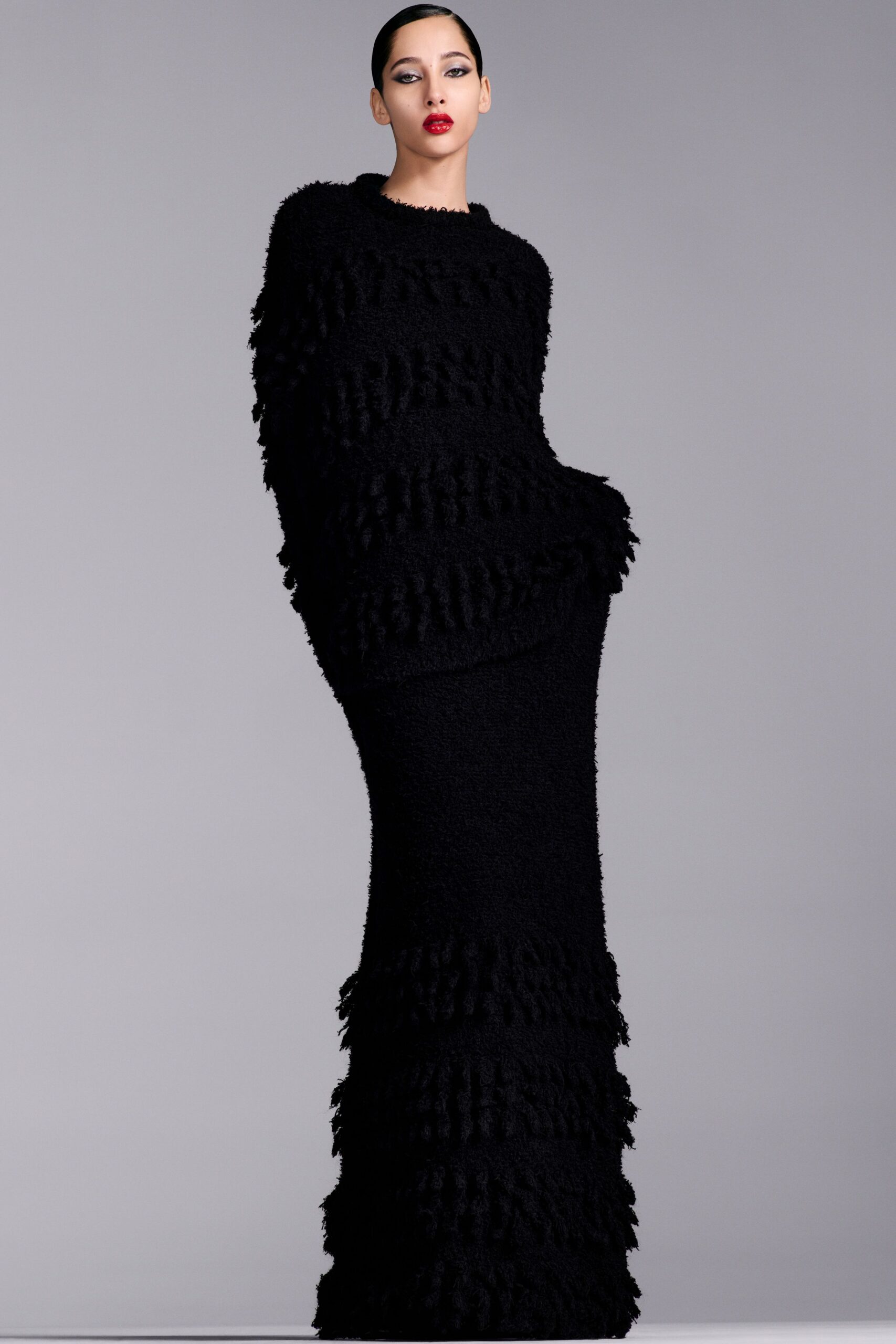 black wool ruffled gown