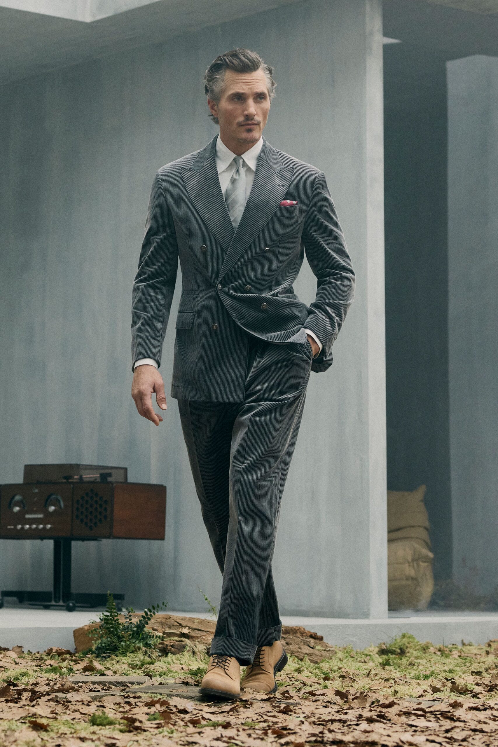 gray tailored suit with beige shoes