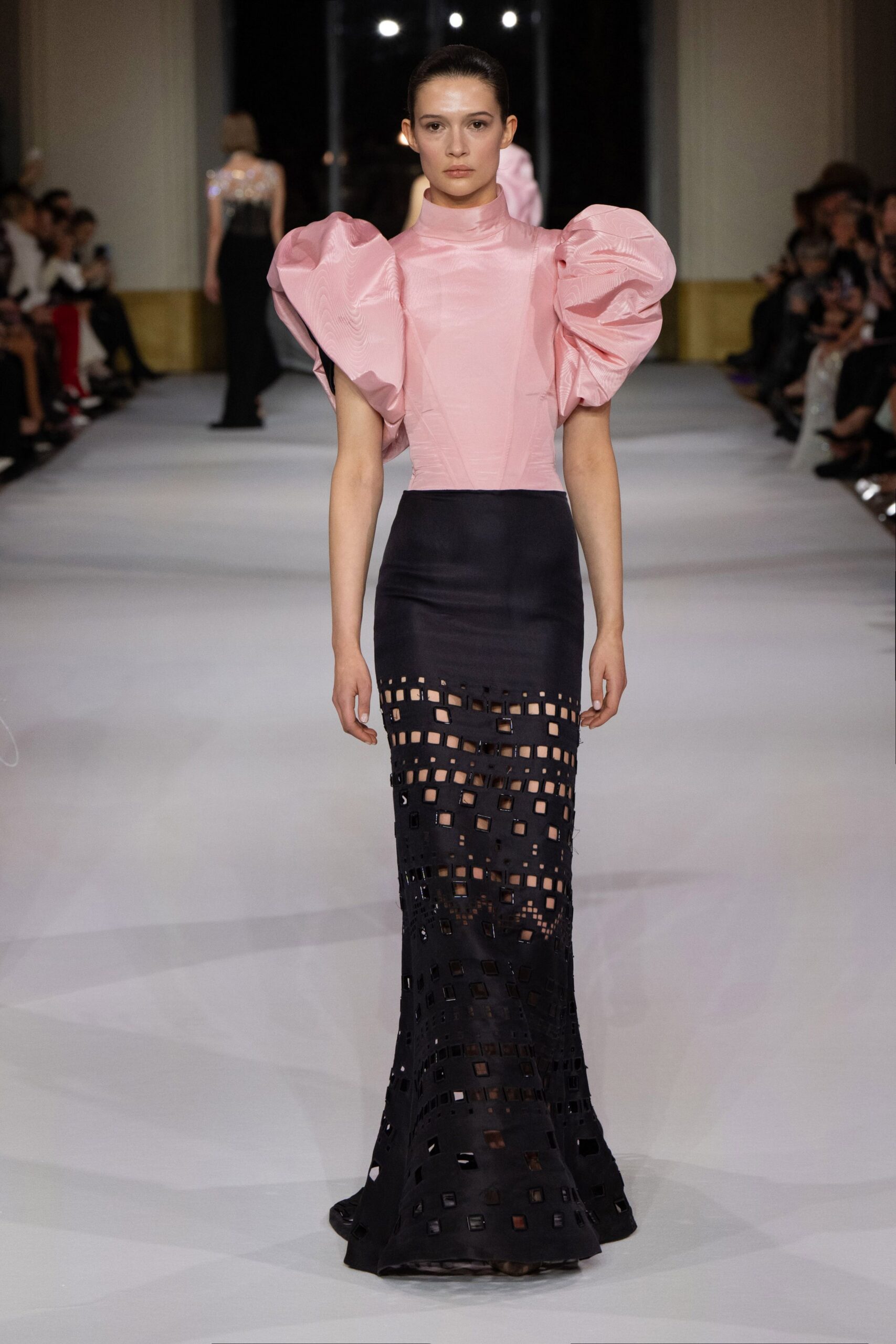 pink puffed sleeve top and black cutout skirt