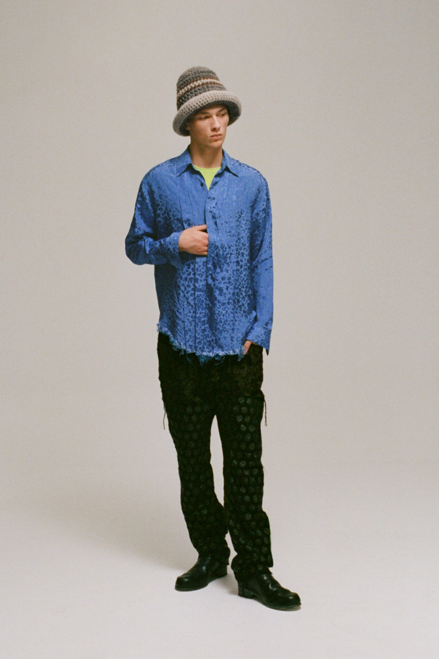 blue printed shirt with black cargo pants