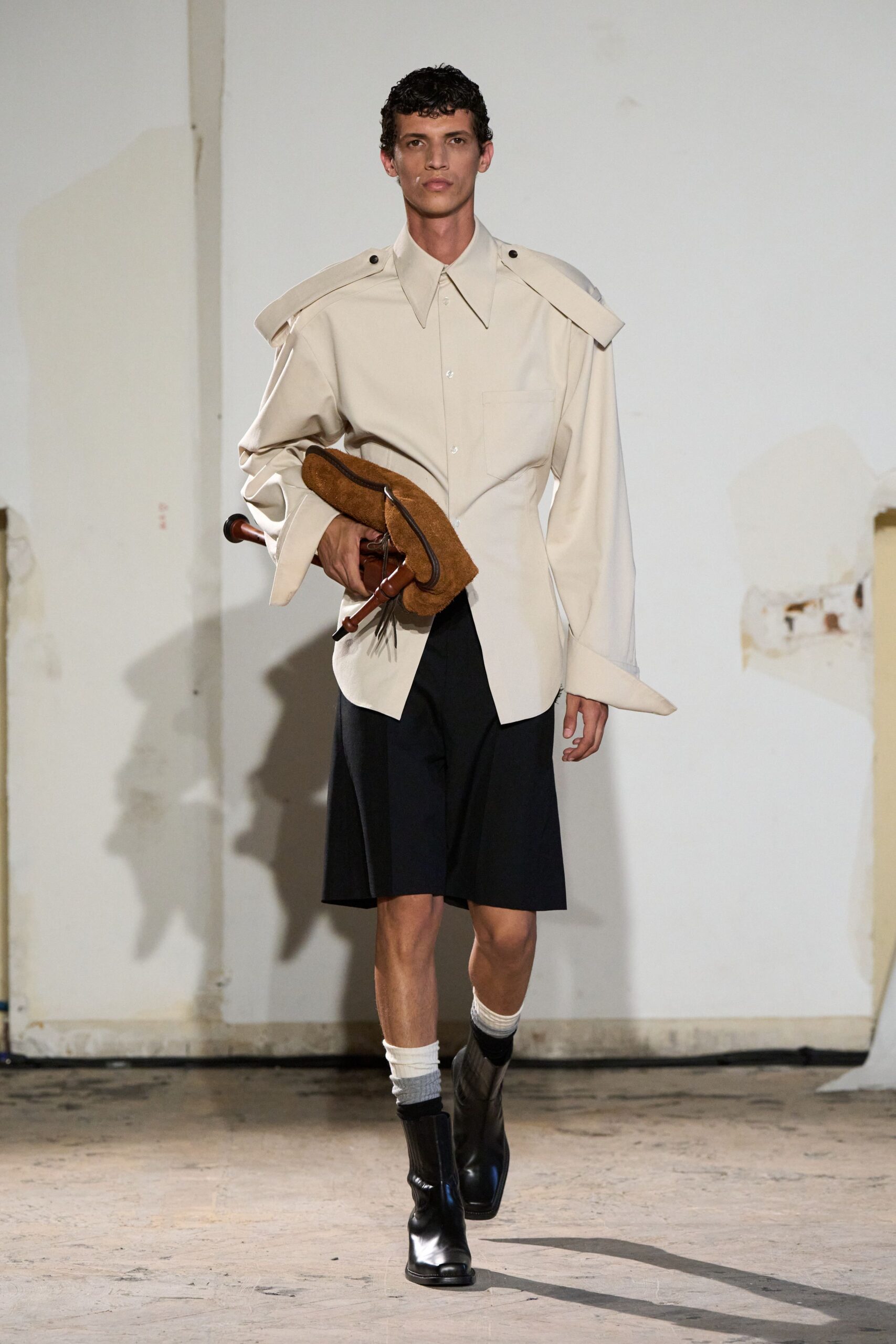 beige relaxed shirt with black shorts