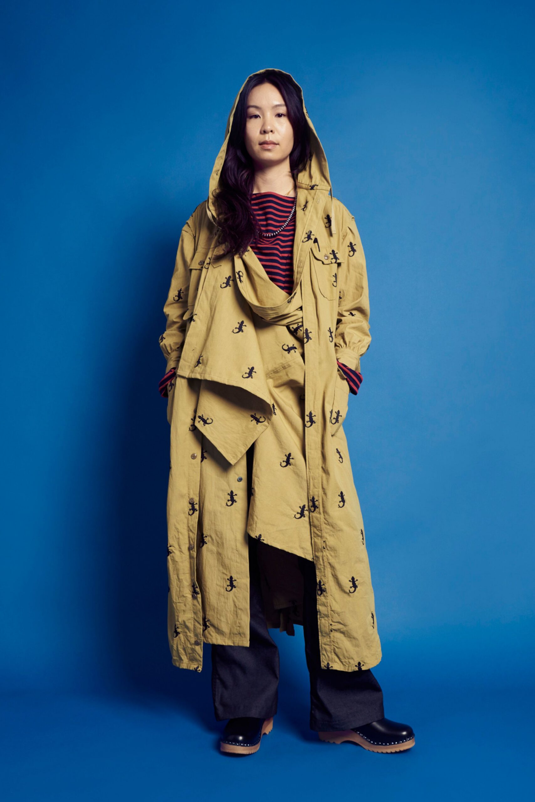 beige embroidered coat with striped top