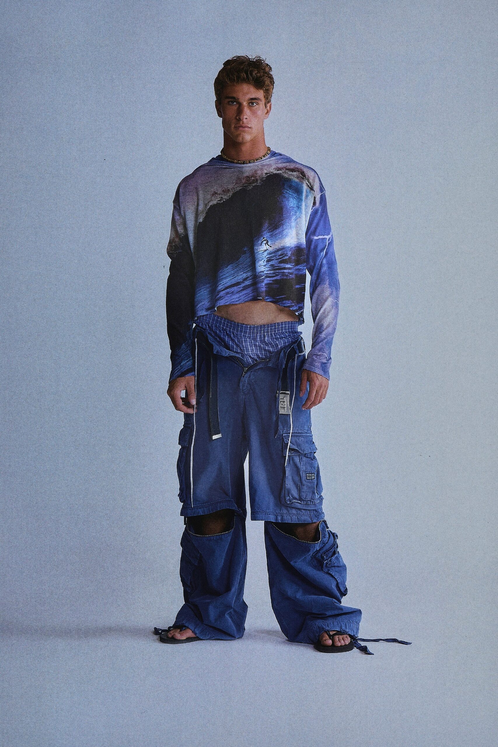 blue printed cropped top with cargo pants
