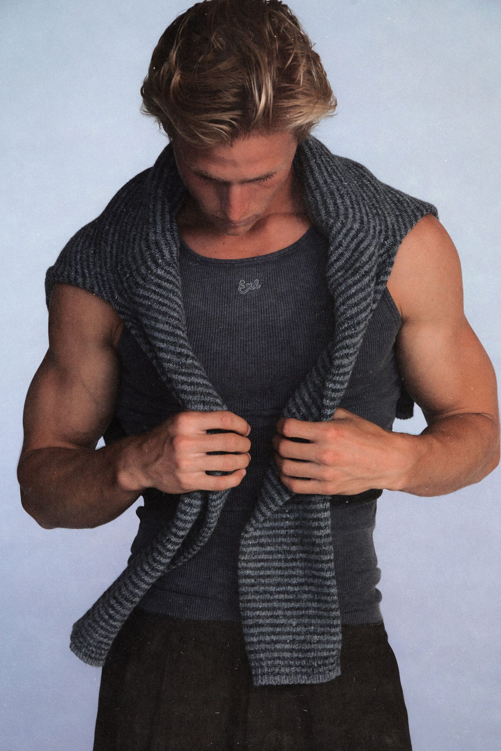 gray tank-top with cardigan and black pants