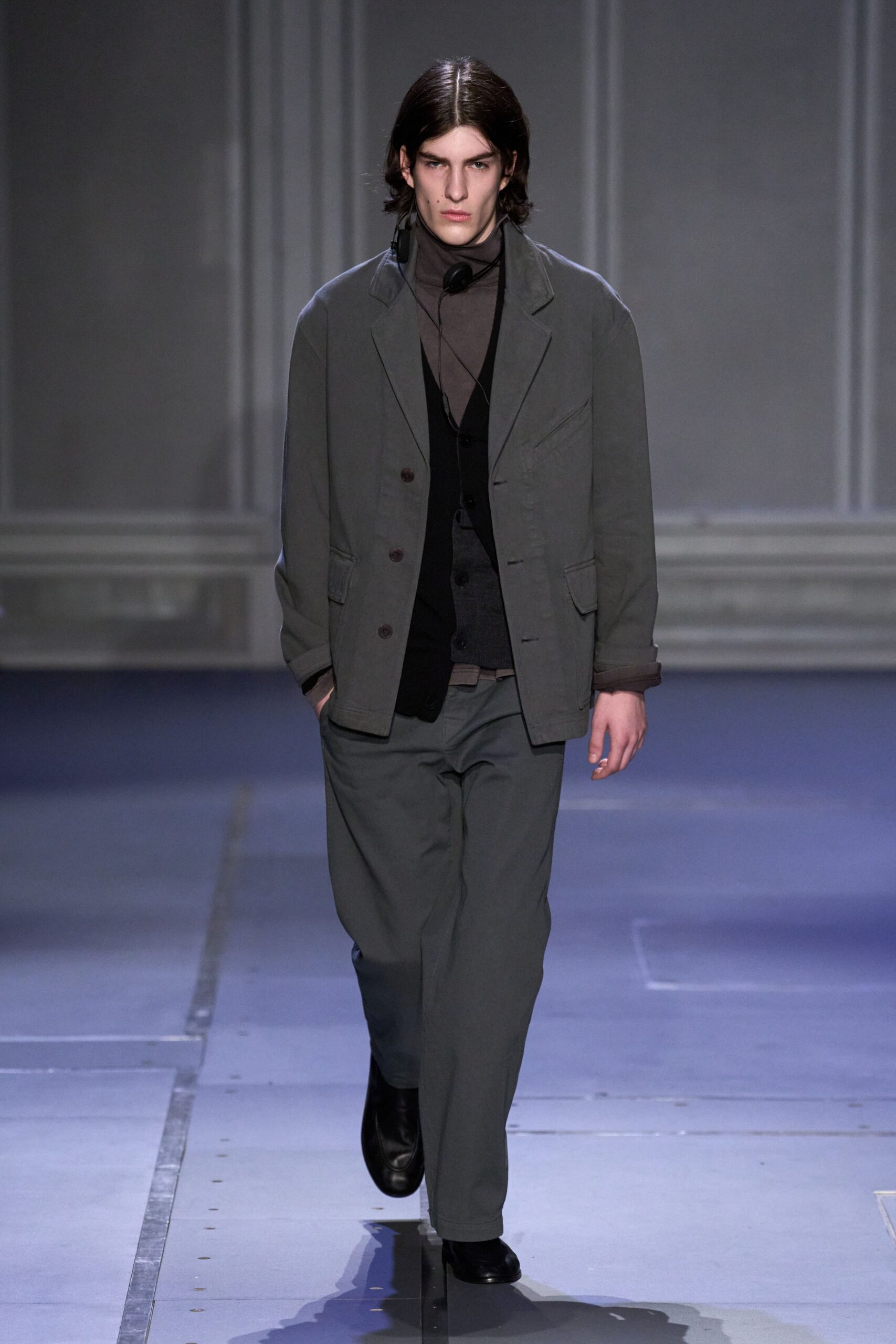gray jacket black vest relaxed pants