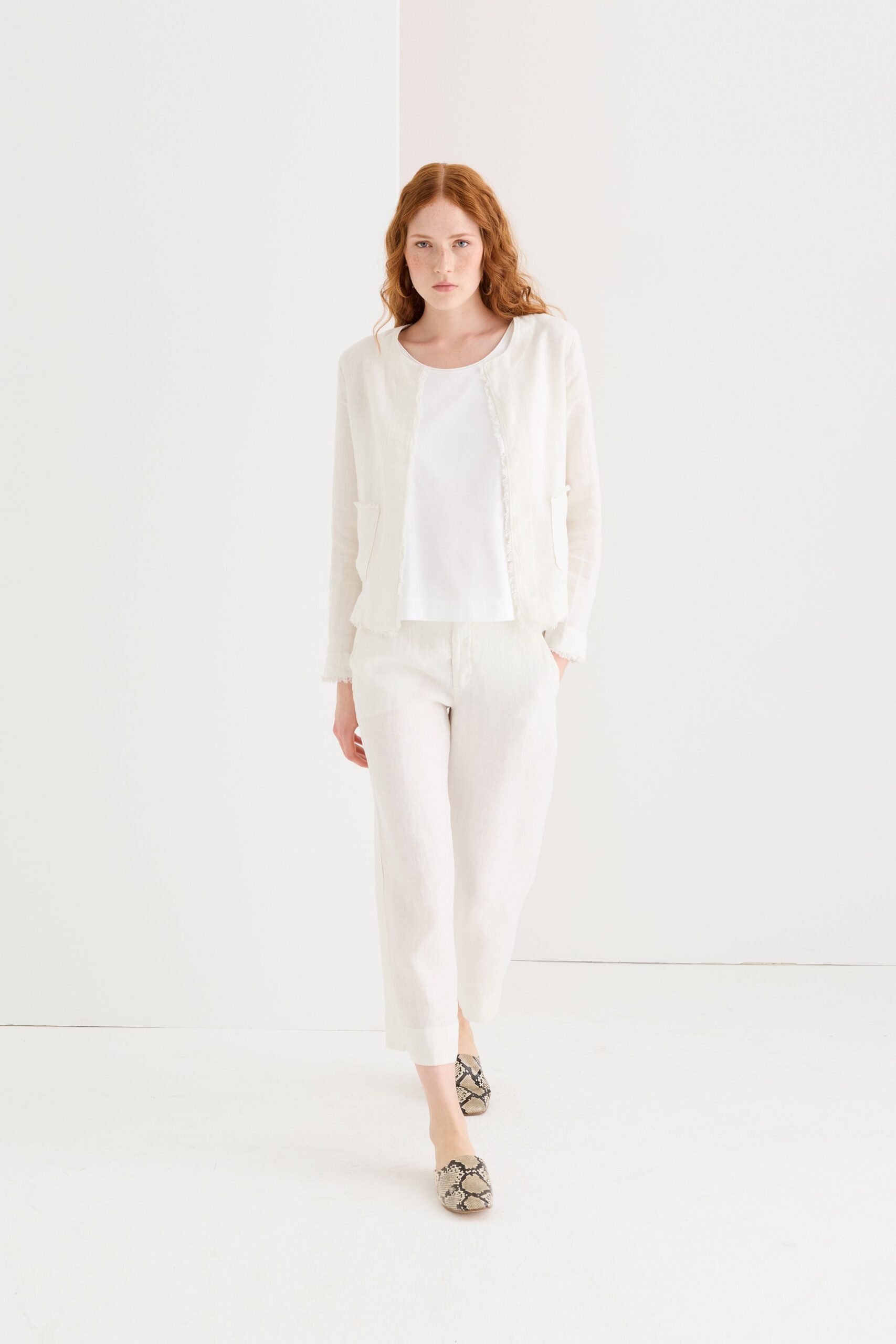 white relaxed jacket with top and pants