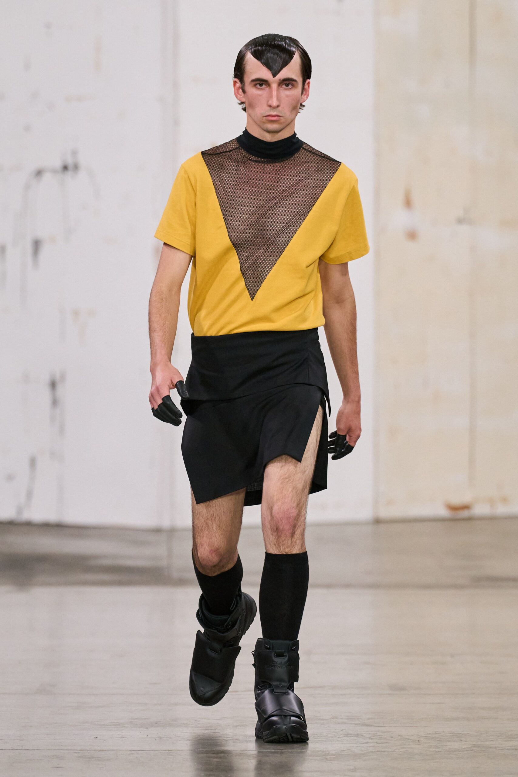 yellow t-shirt black skirt