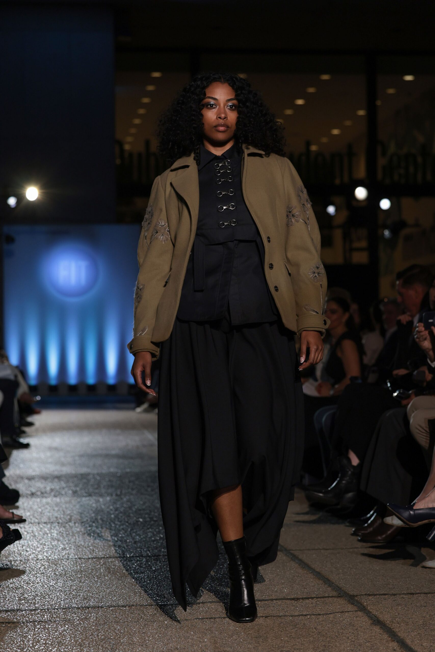 beige relaxed jacket black shirt