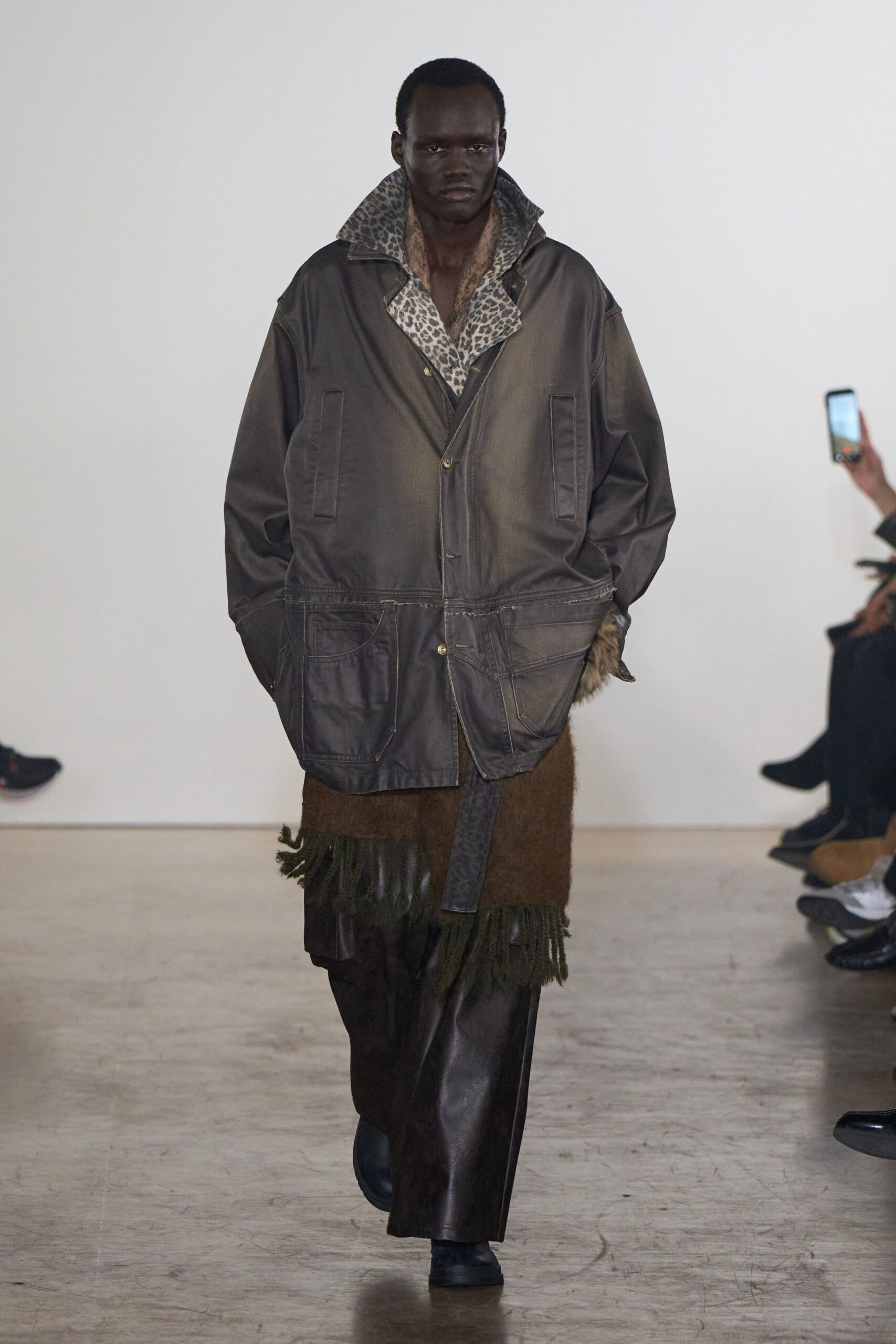 brown leather jacket with printed shirt