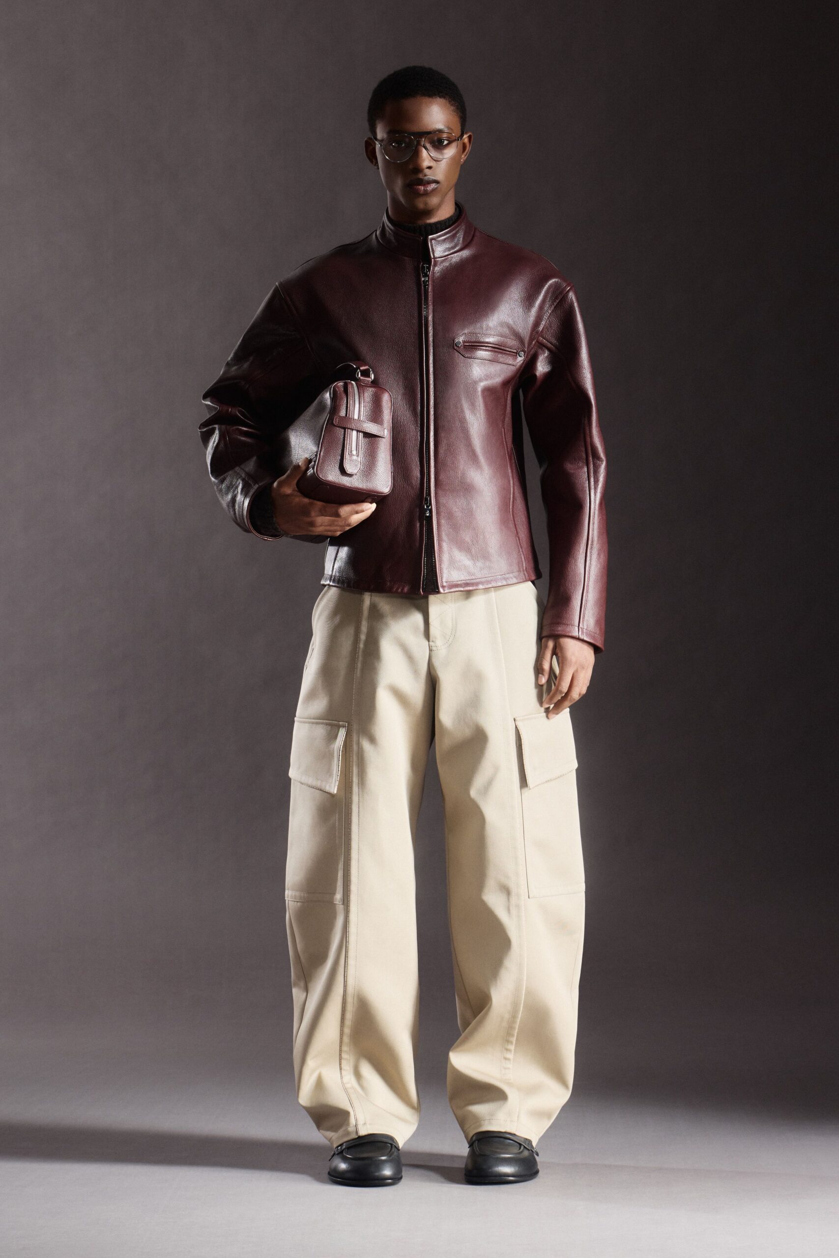brown leather jacket with cargo pants