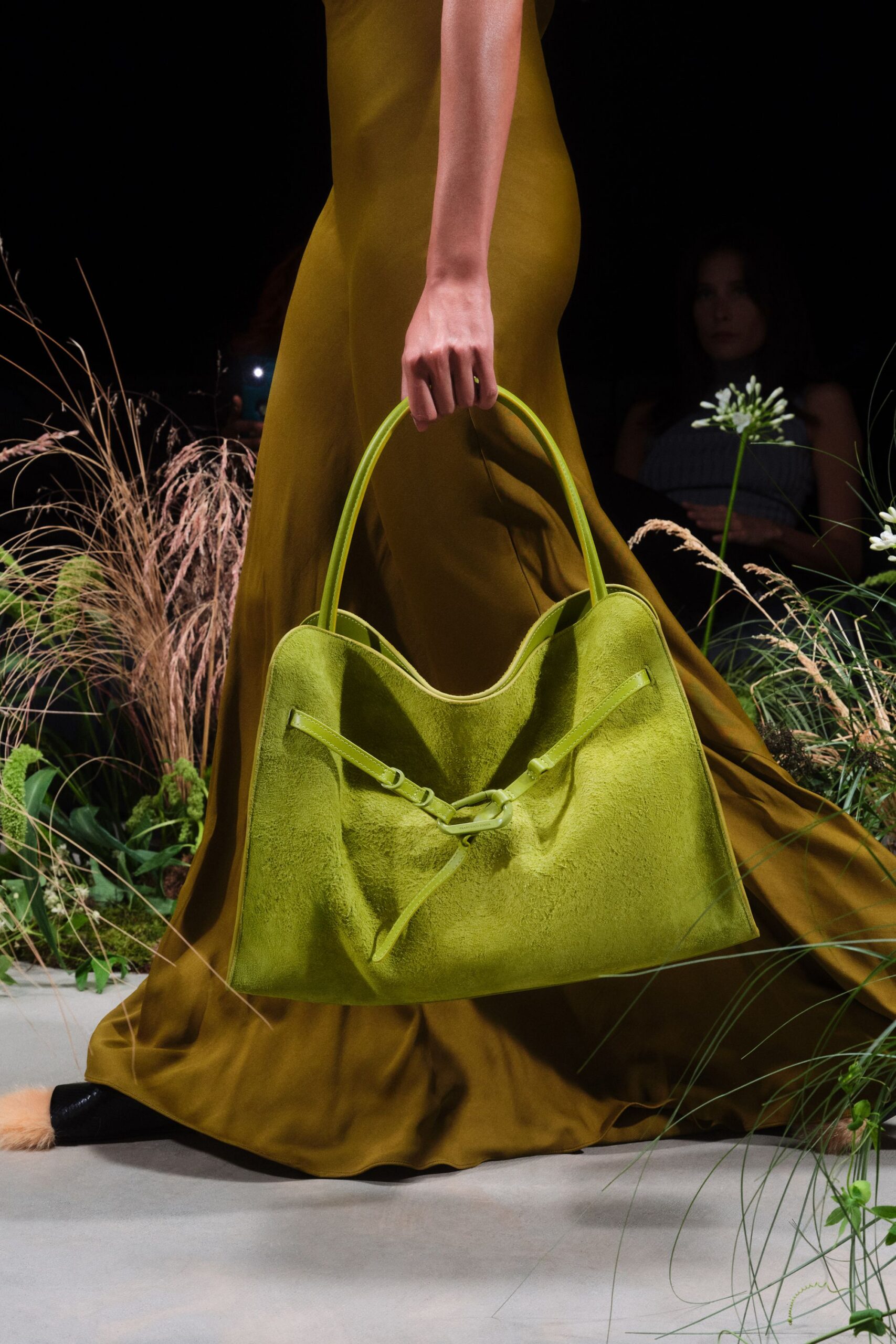 green silk sleeveless dress with bag
