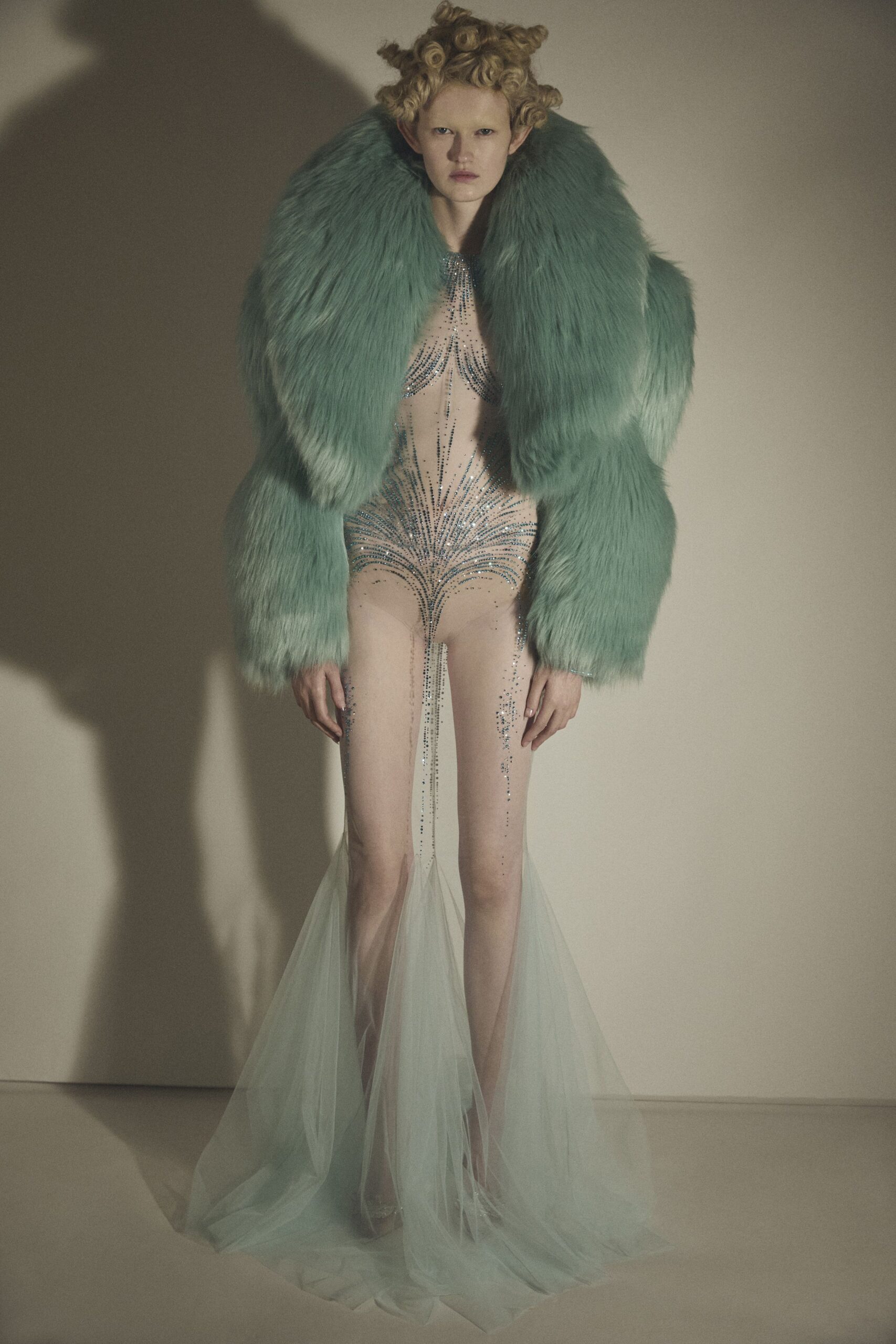 blue faux-fur coat and gown