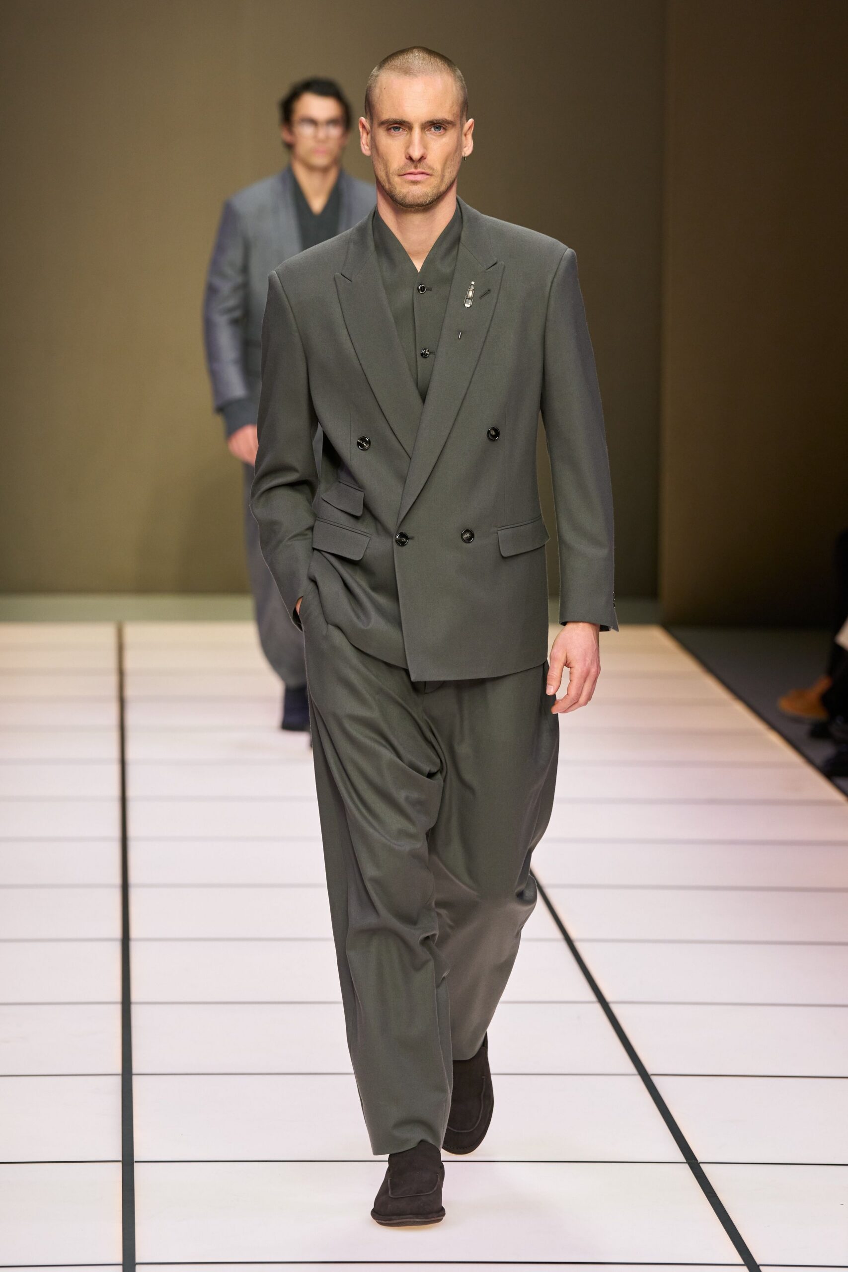 gray tailored suit with black shoes