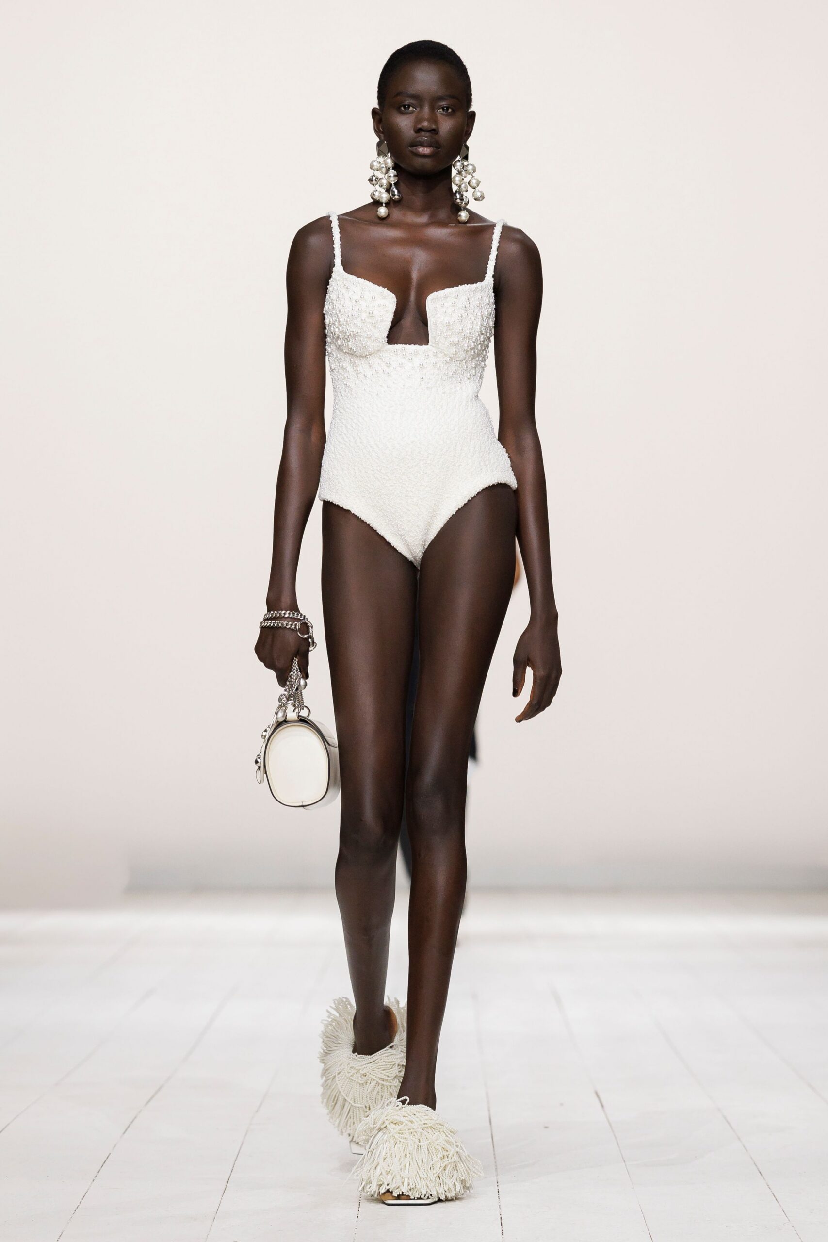 white cotton sleeveless v-neck fitted textured bodysuit