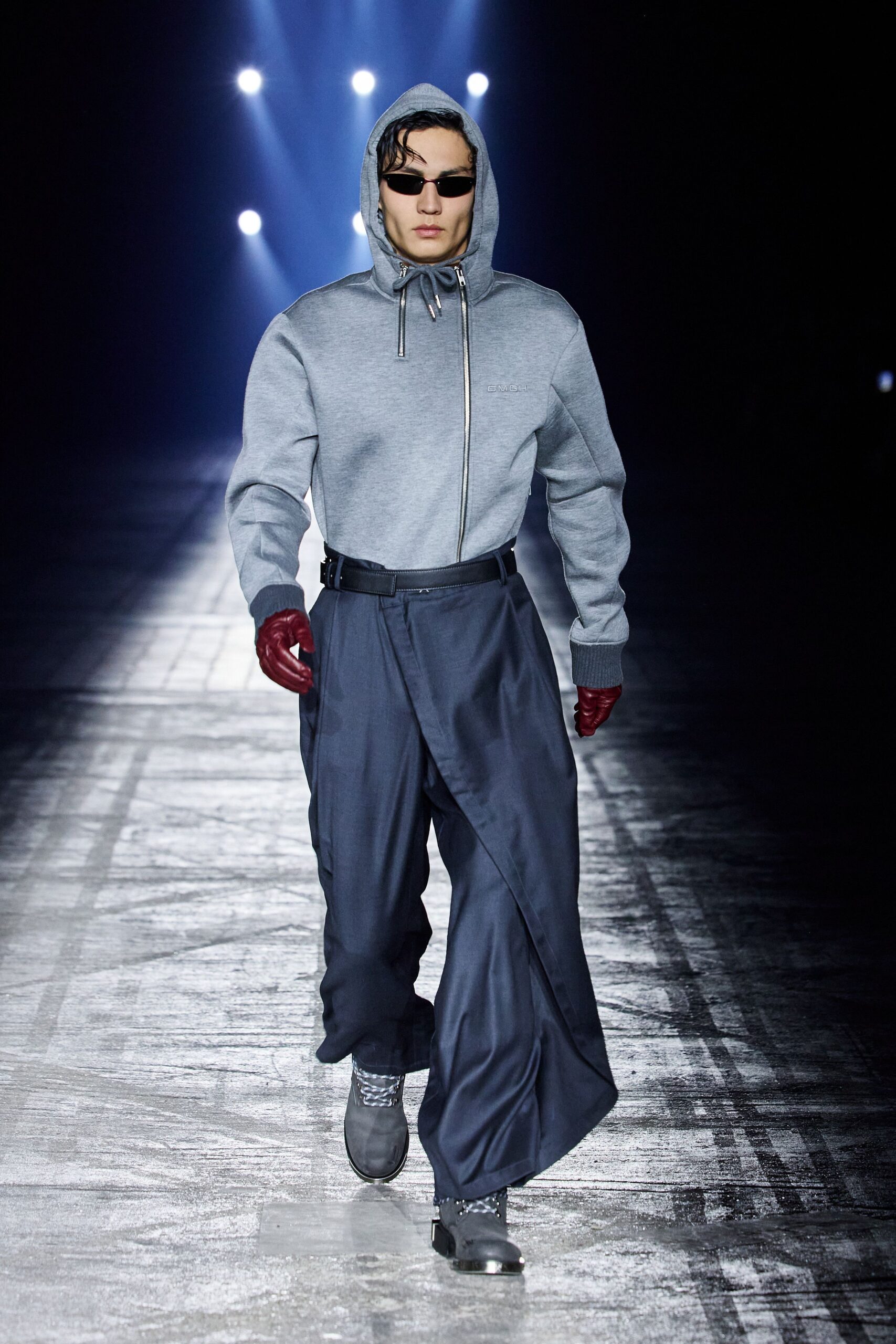 gray hoodie and blue wide-leg pants