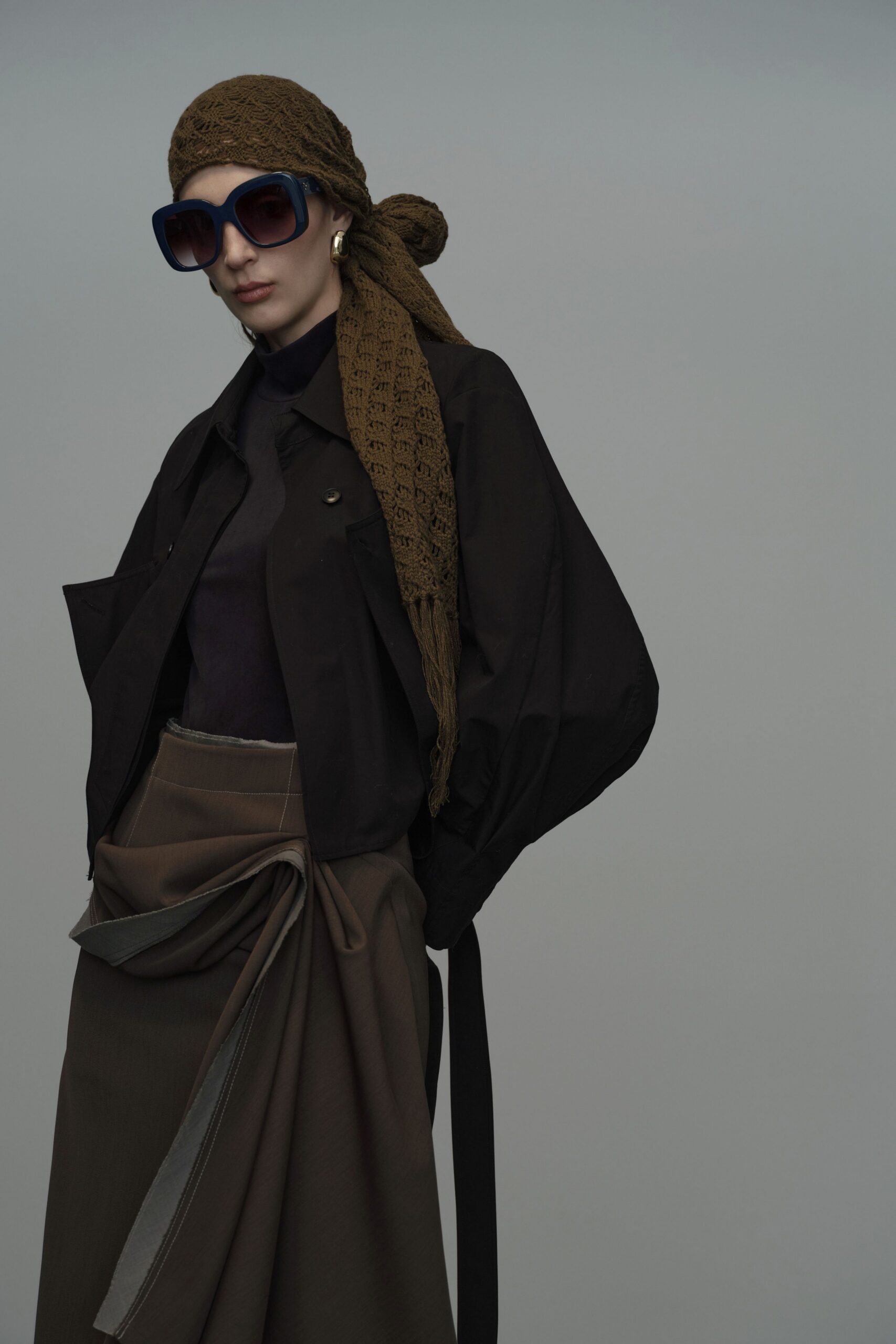 black jacket purple top brown skirt