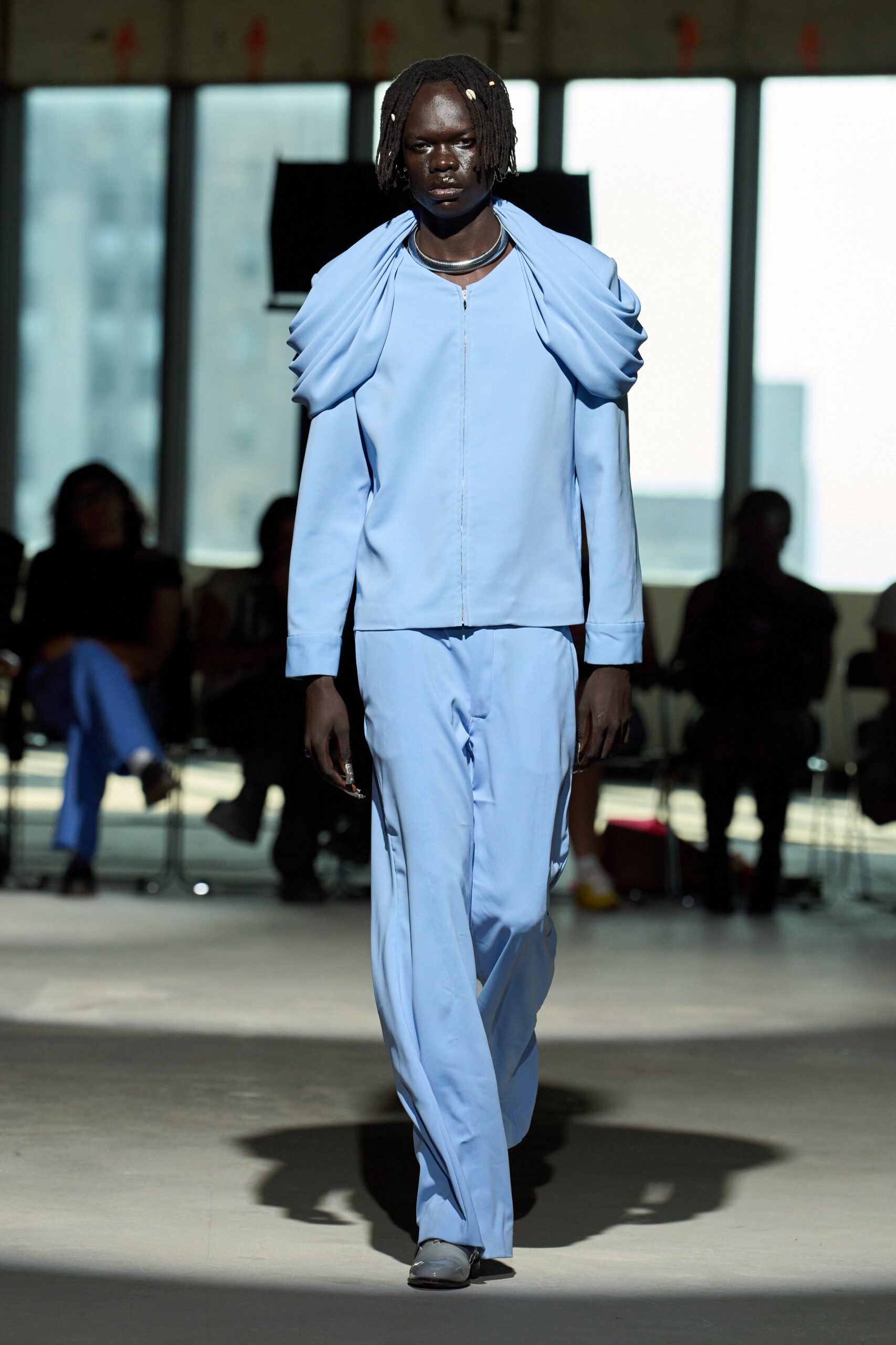 blue fitted suit with pleats