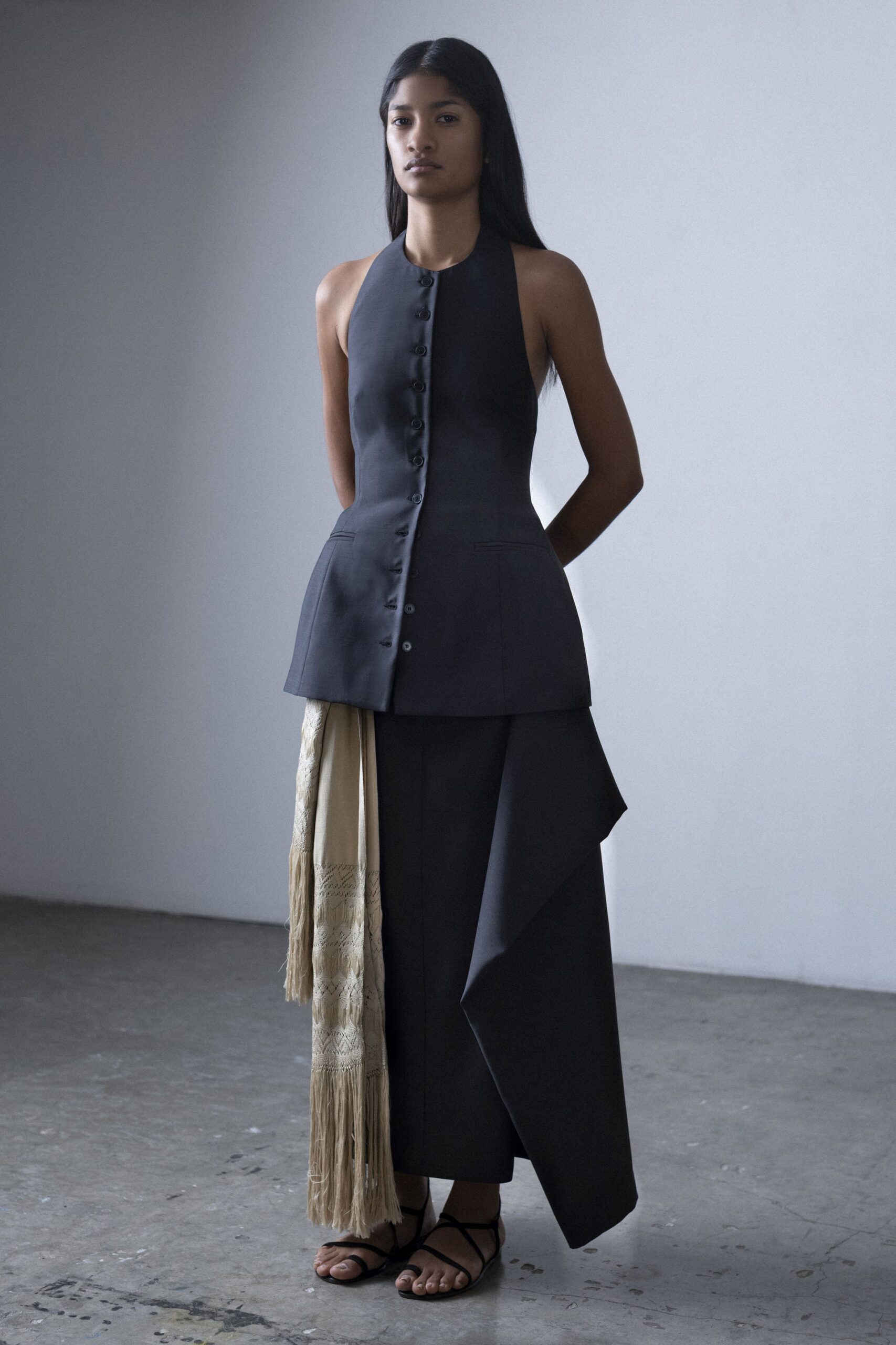 black cotton sleeveless high-neck fitted buttoned top