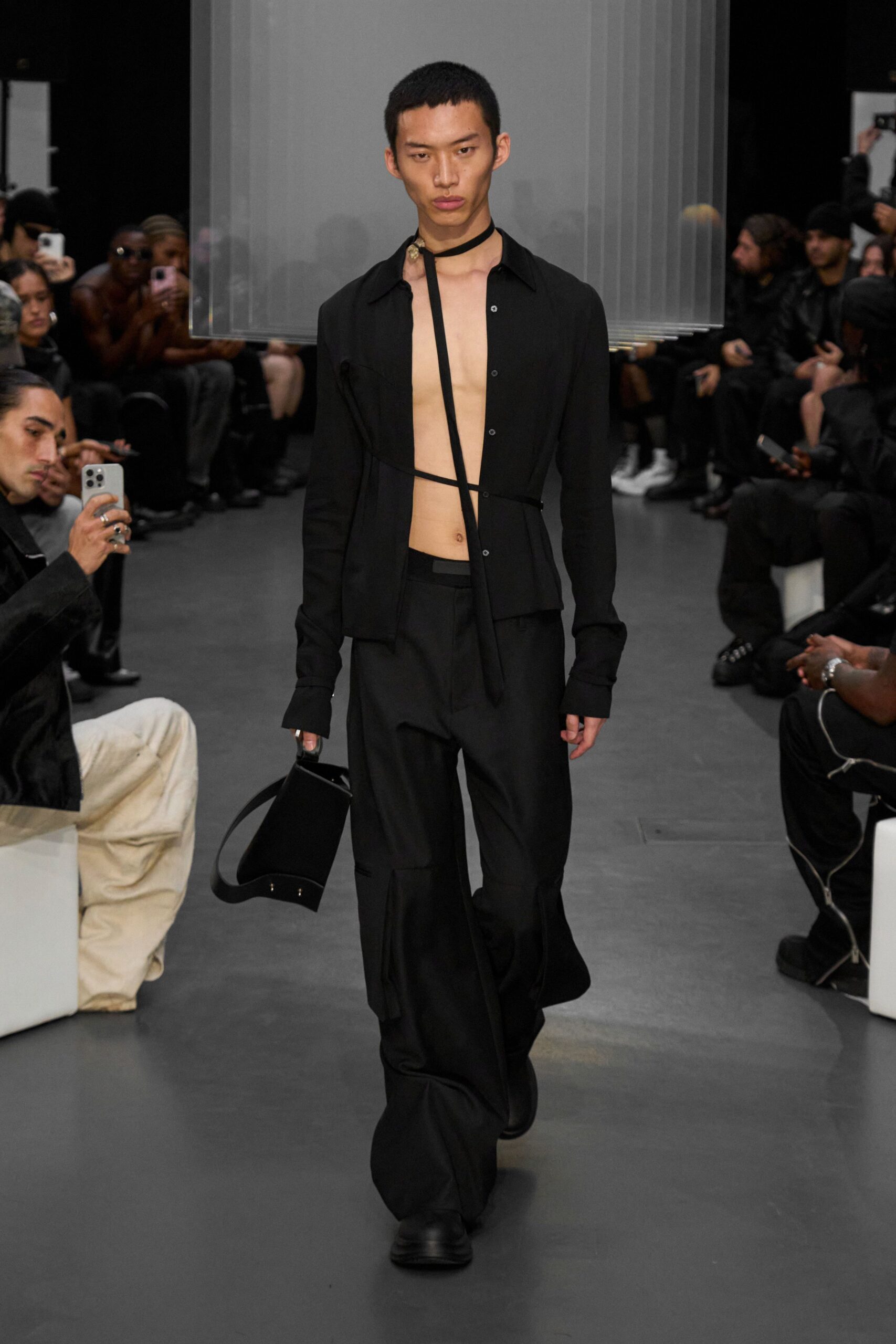 black fitted shirt and relaxed pants