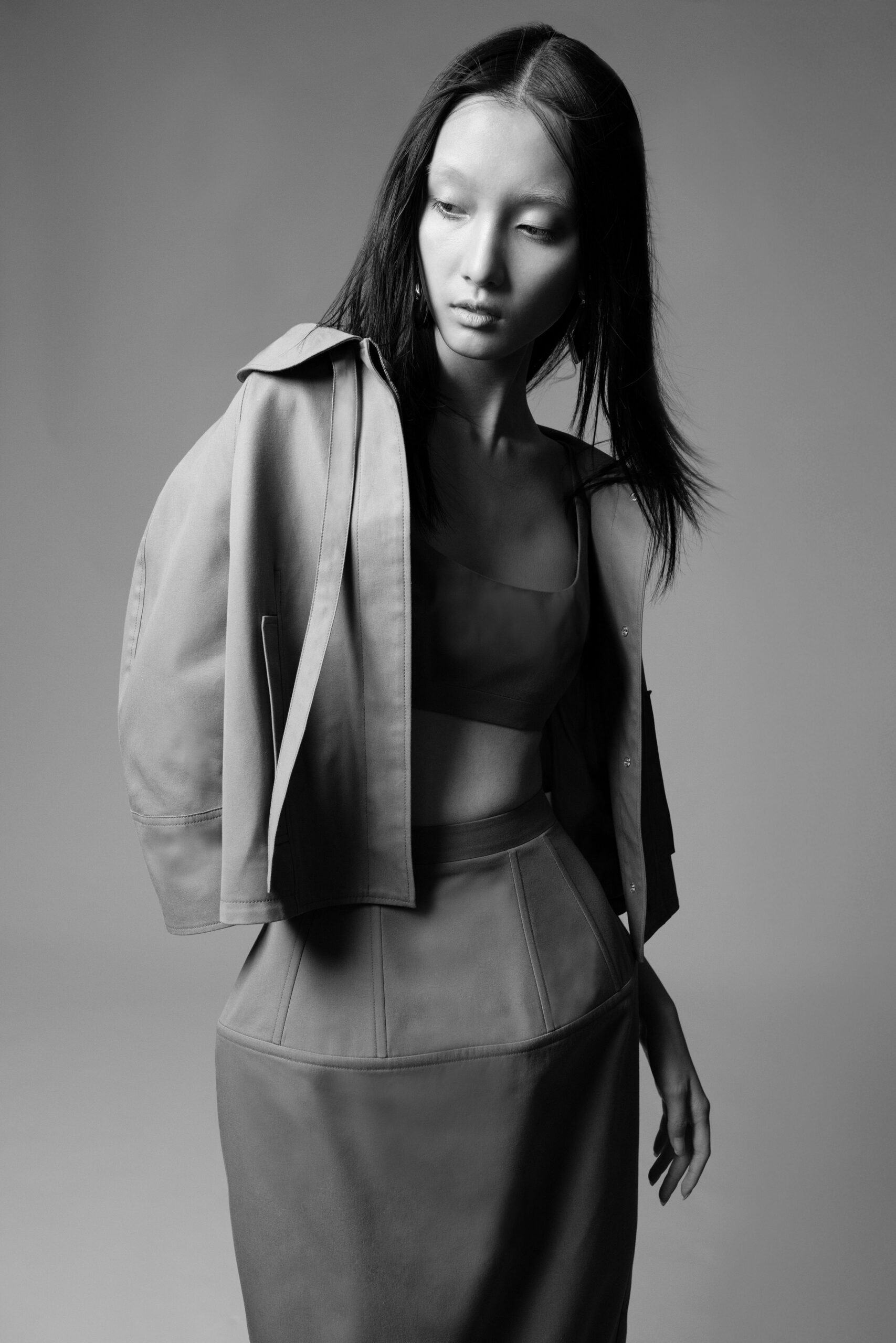 gray leather fitted top and skirt