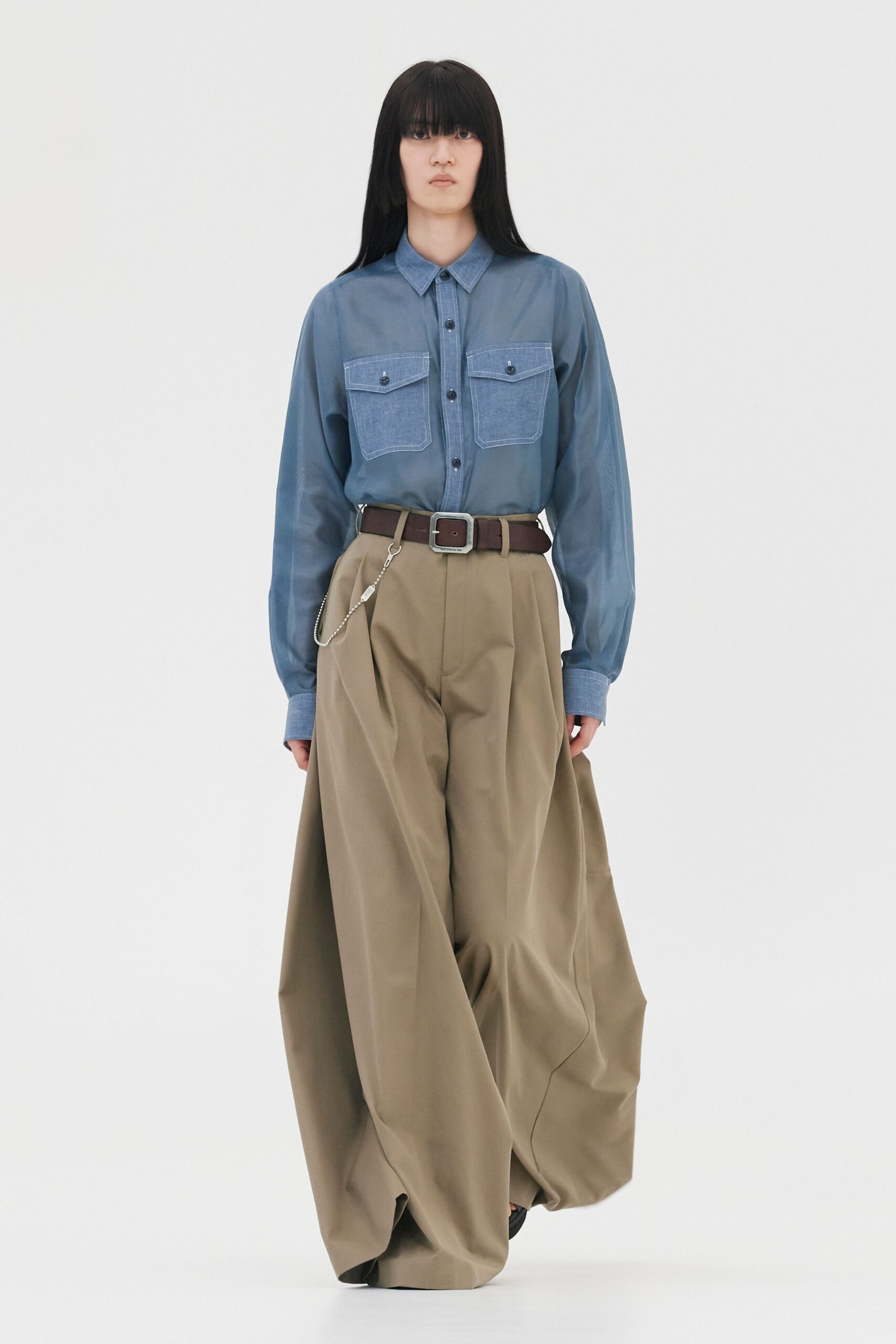 blue shirt beige wide-leg pants