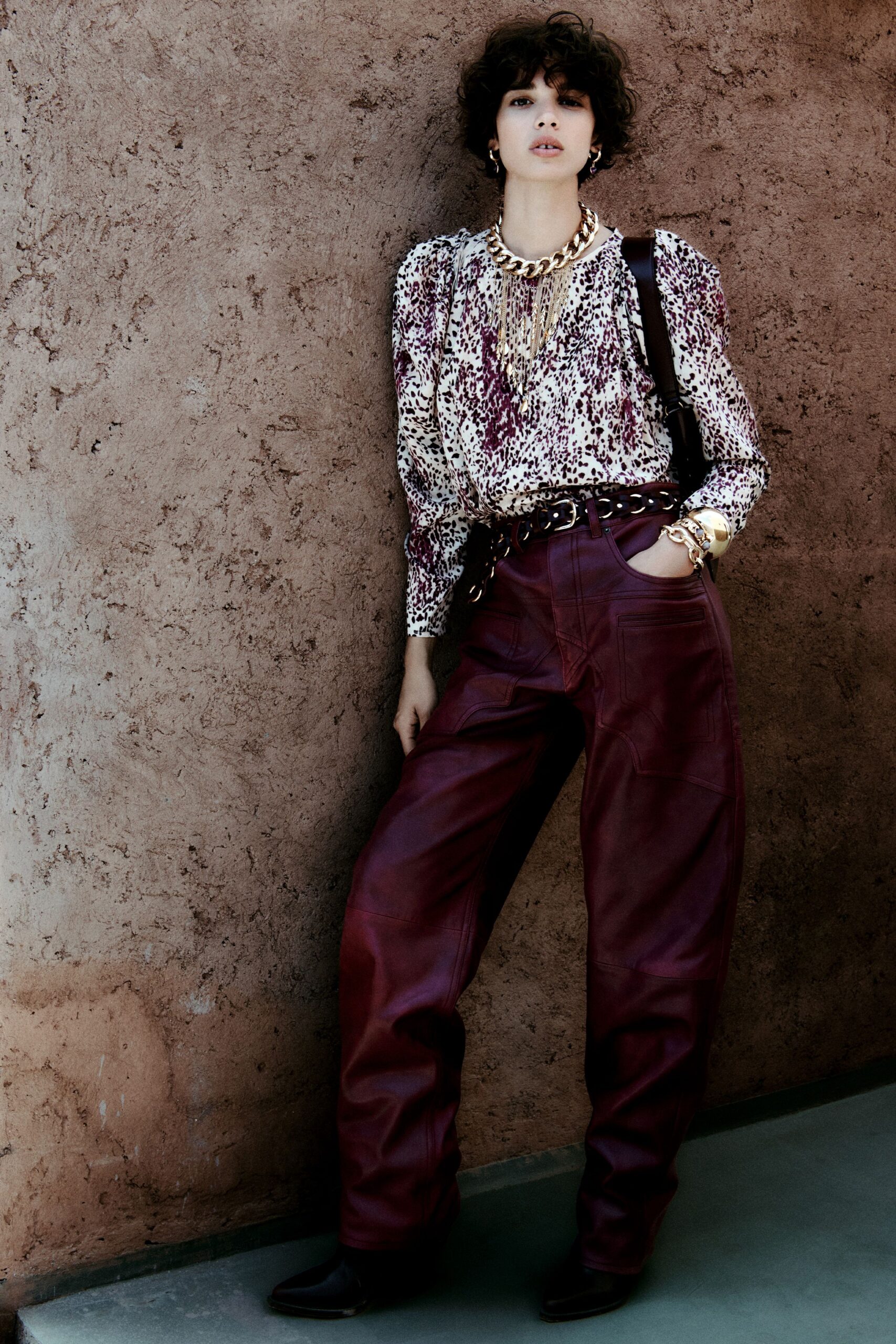 printed silk blouse with leather pants