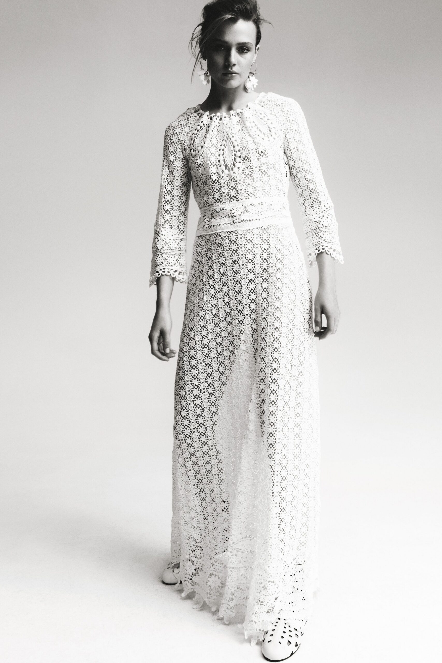 white lace maxi gown with cutout shoes