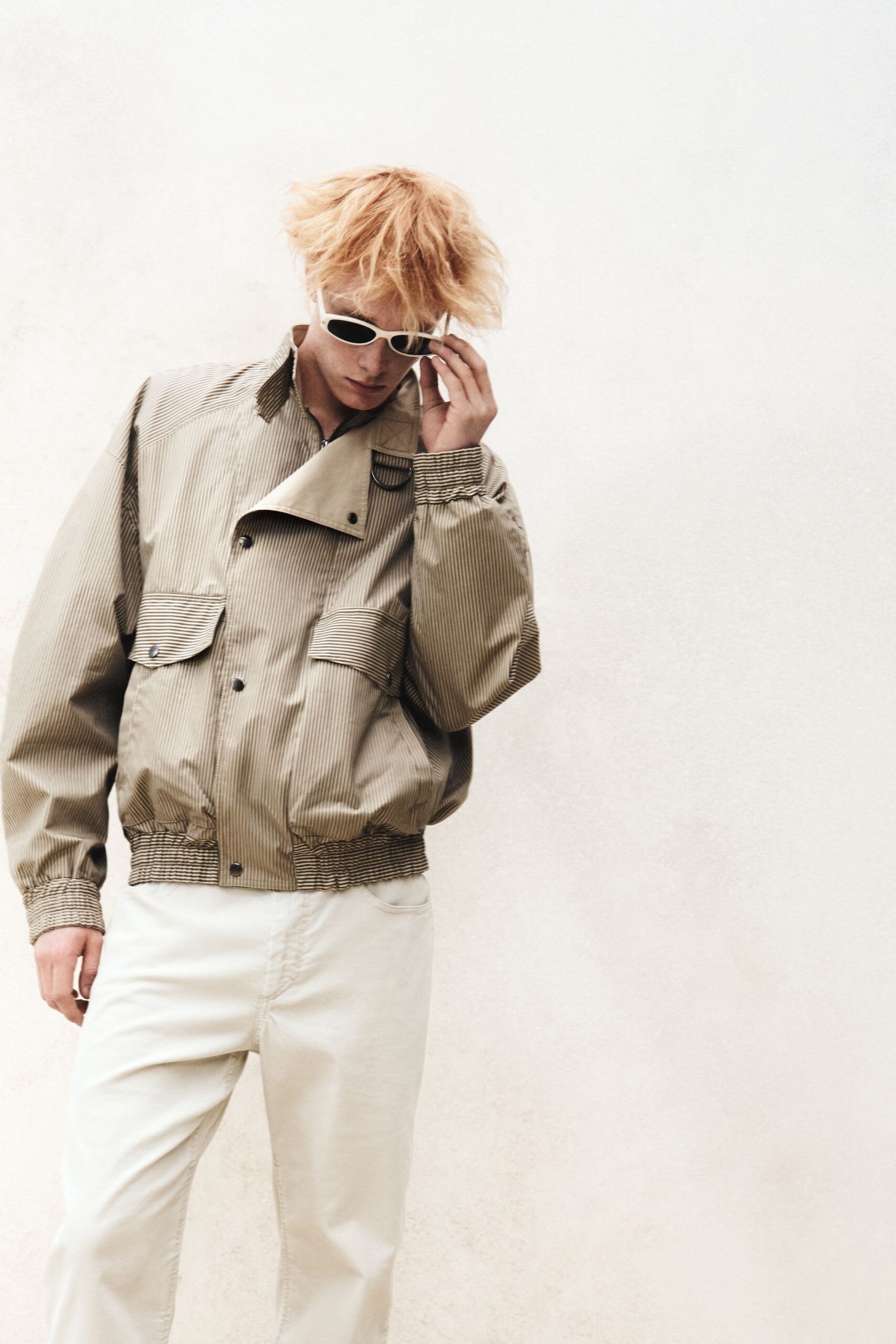 beige relaxed jacket with white pants