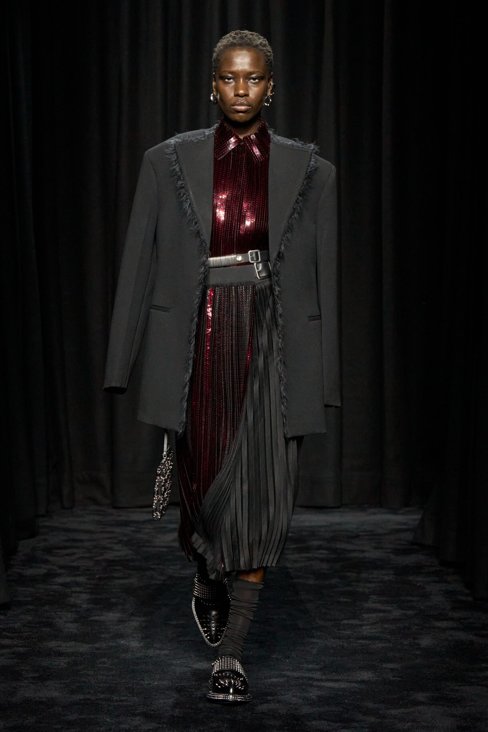 black blazer red pleated dress