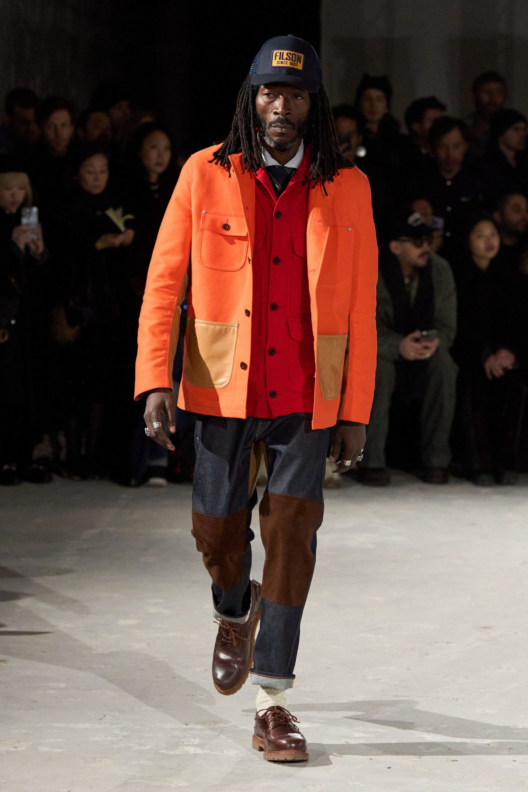 orange jacket red shirt blue pants