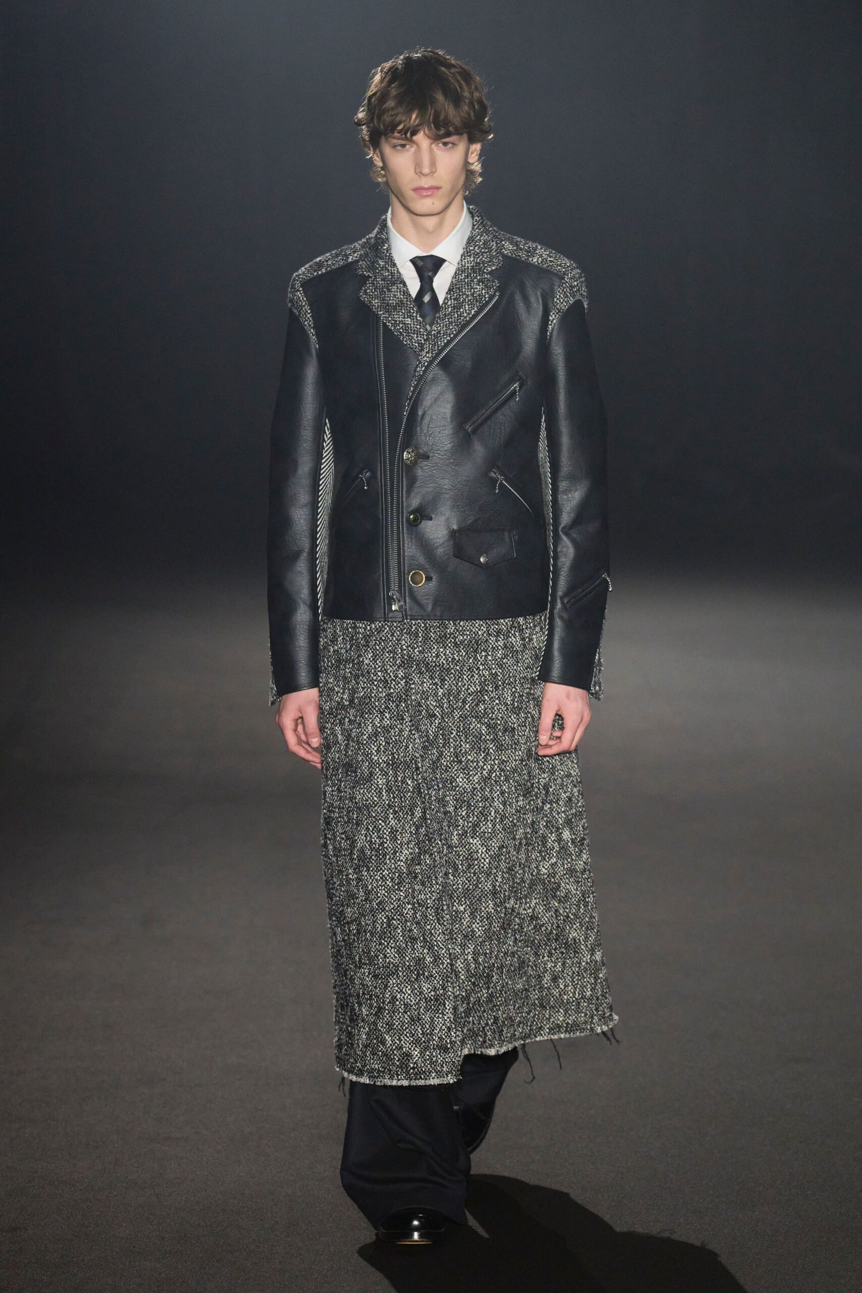 black leather long-sleeve collared structured buttoned layered jacket