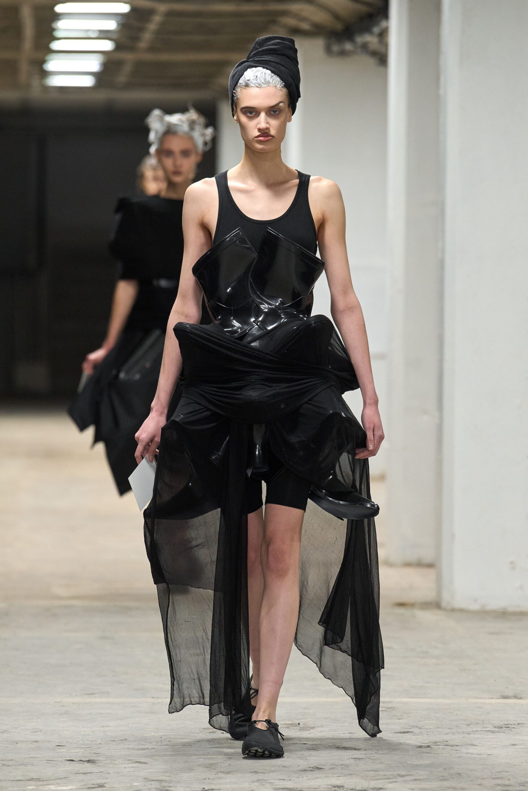 black vinyl sleeveless v-neck fitted draped layered dress