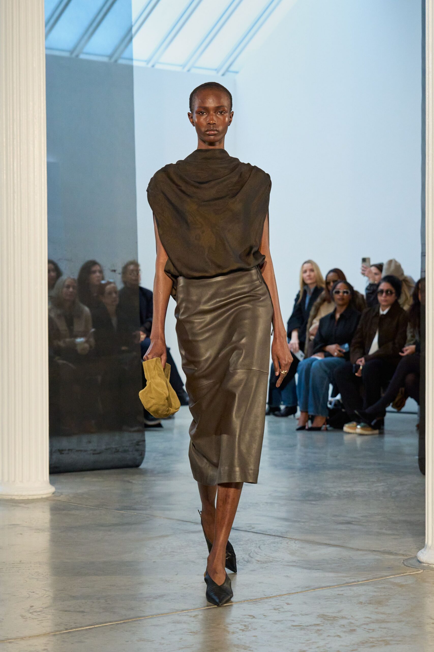 brown silk top and leather skirt