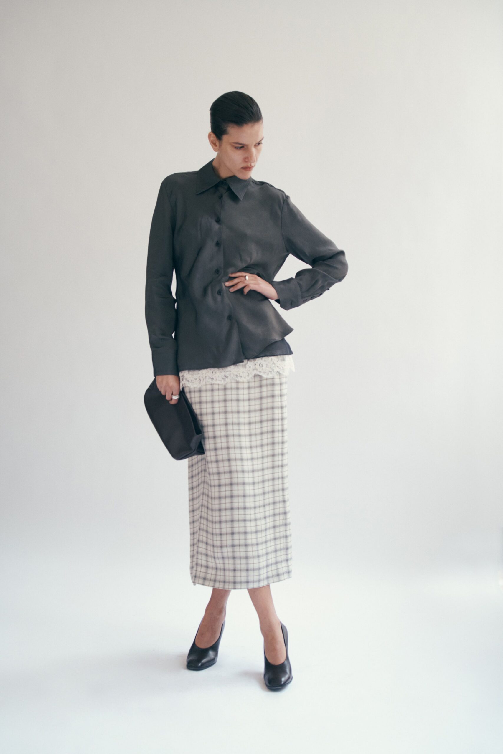 gray shirt white checked skirt