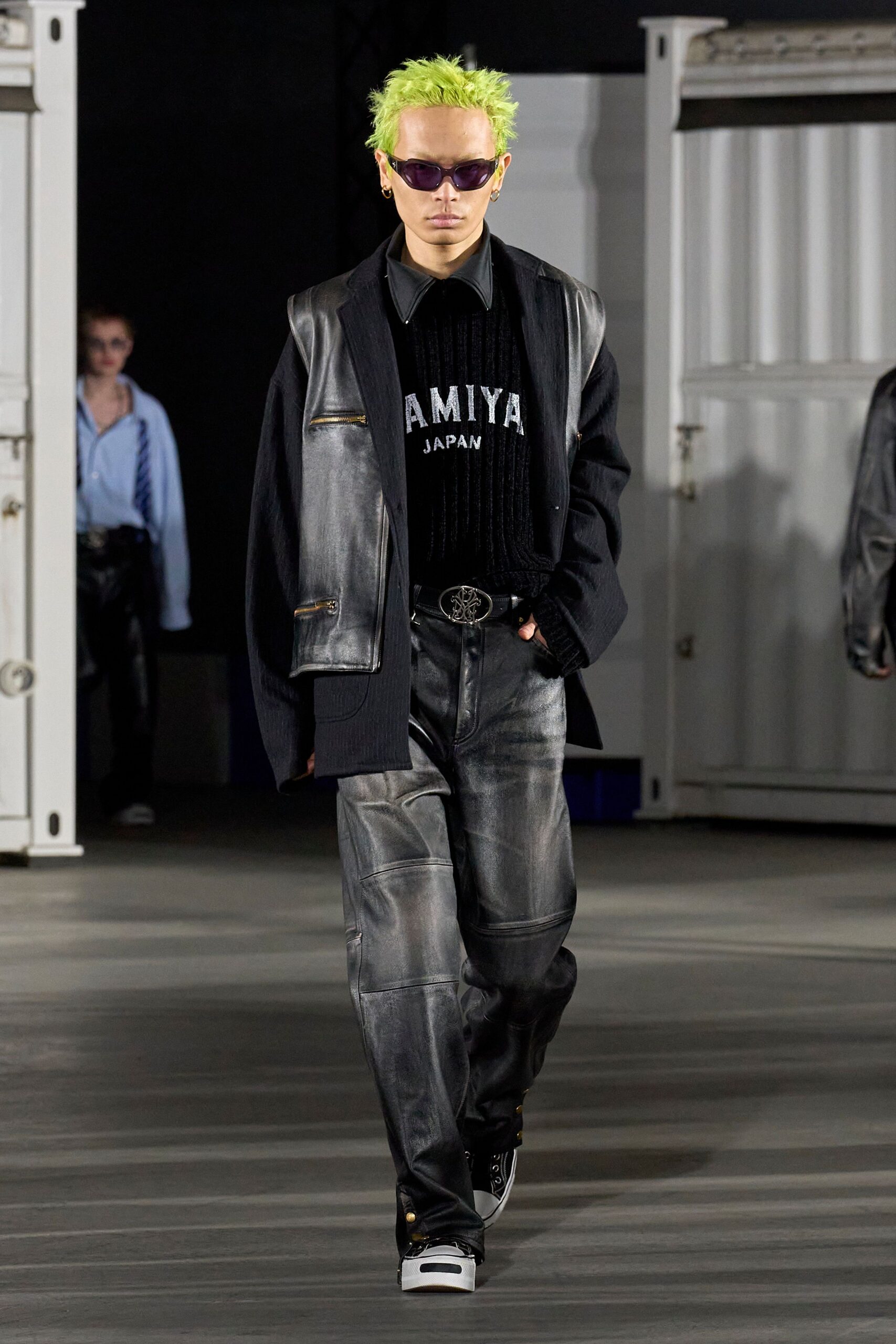 black sweater gray vest pants
