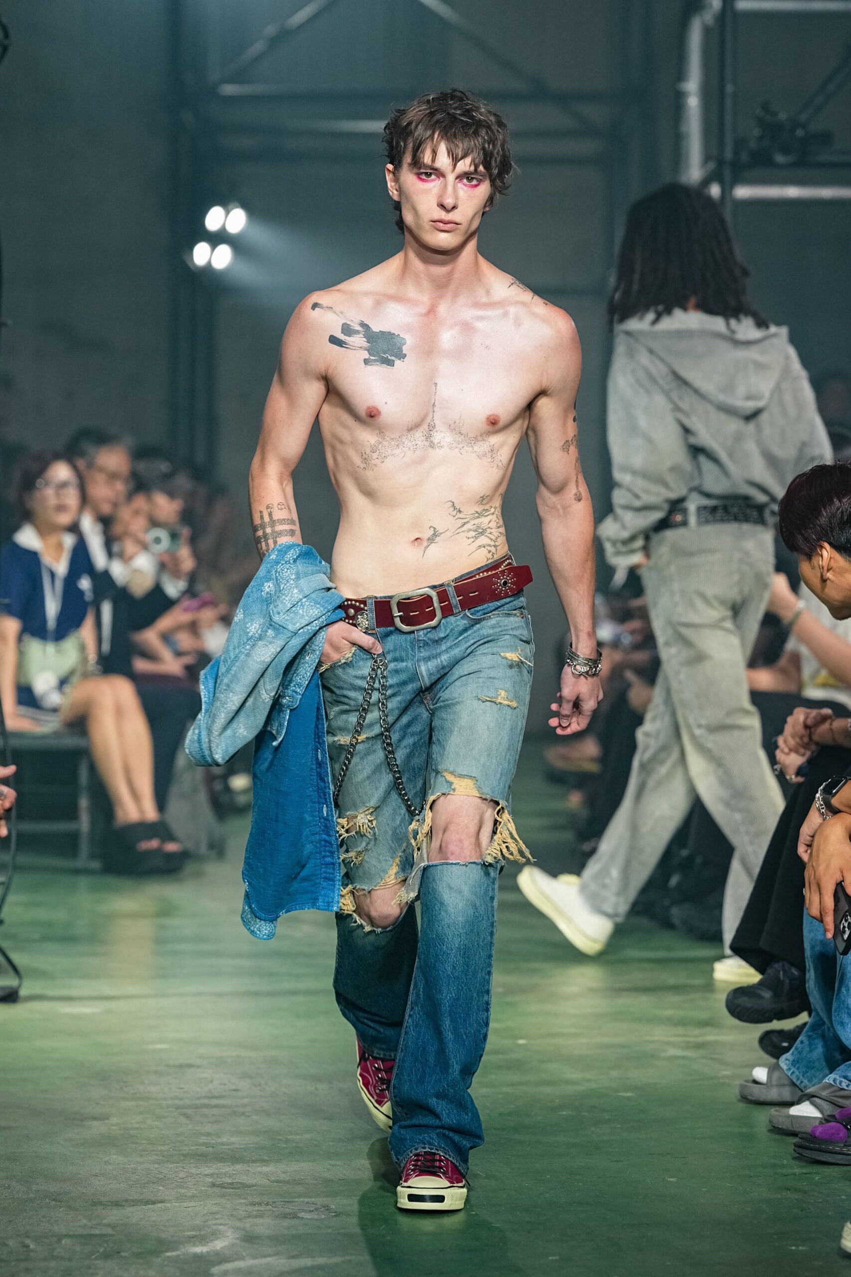 blue denim jeans with sleeveless shirt