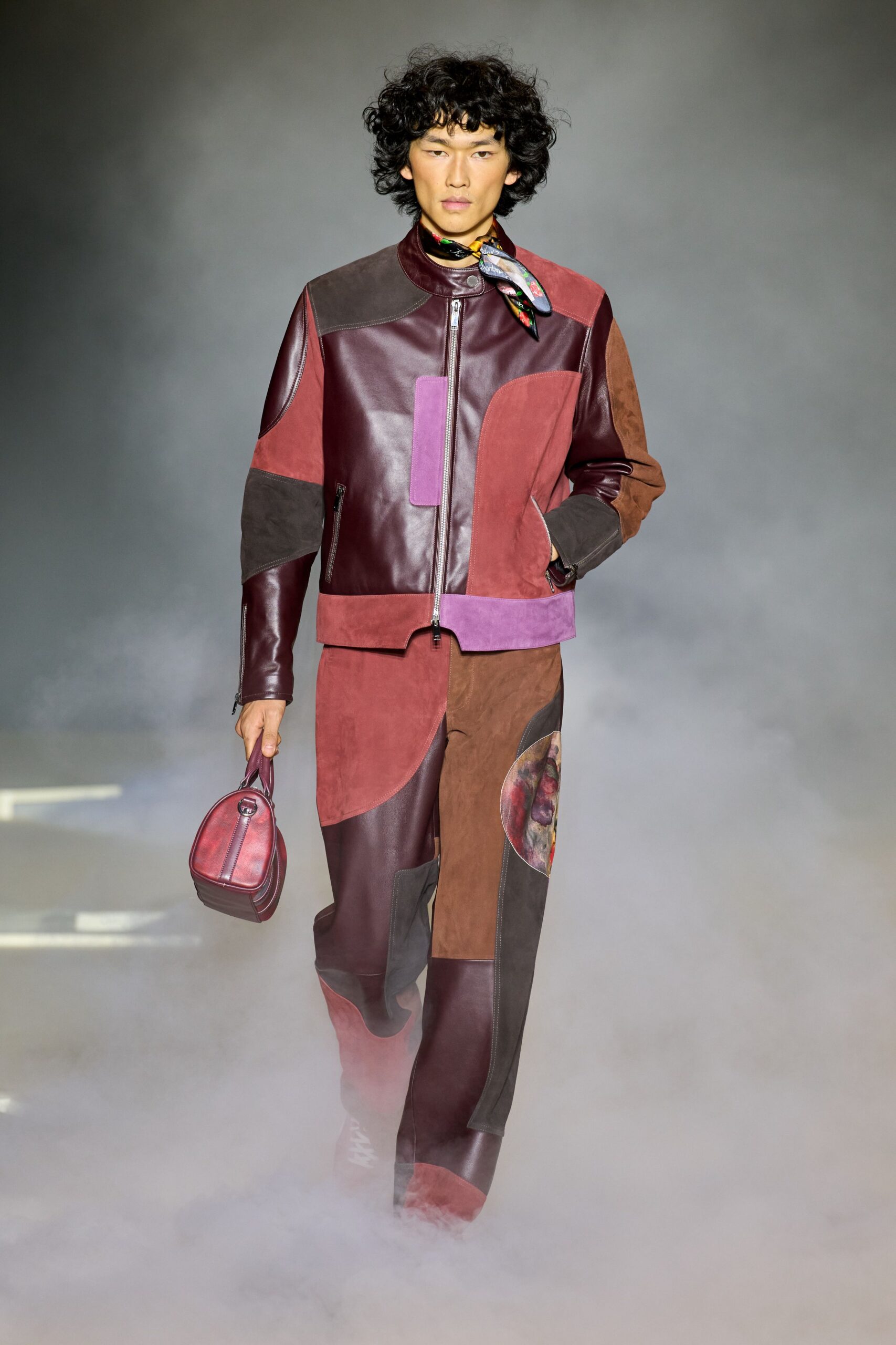 maroon leather jacket with color-blocked pants