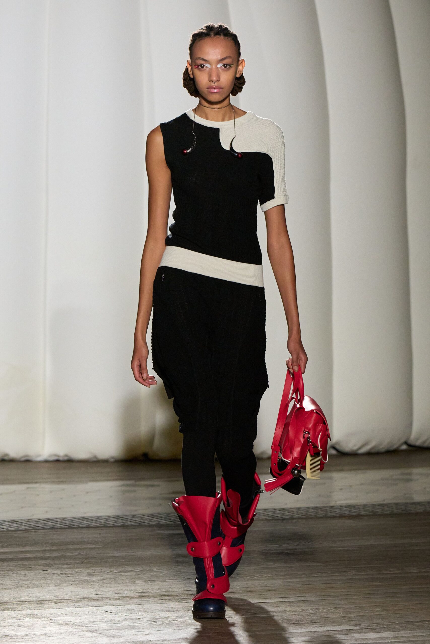 black and white fitted top with relaxed pants