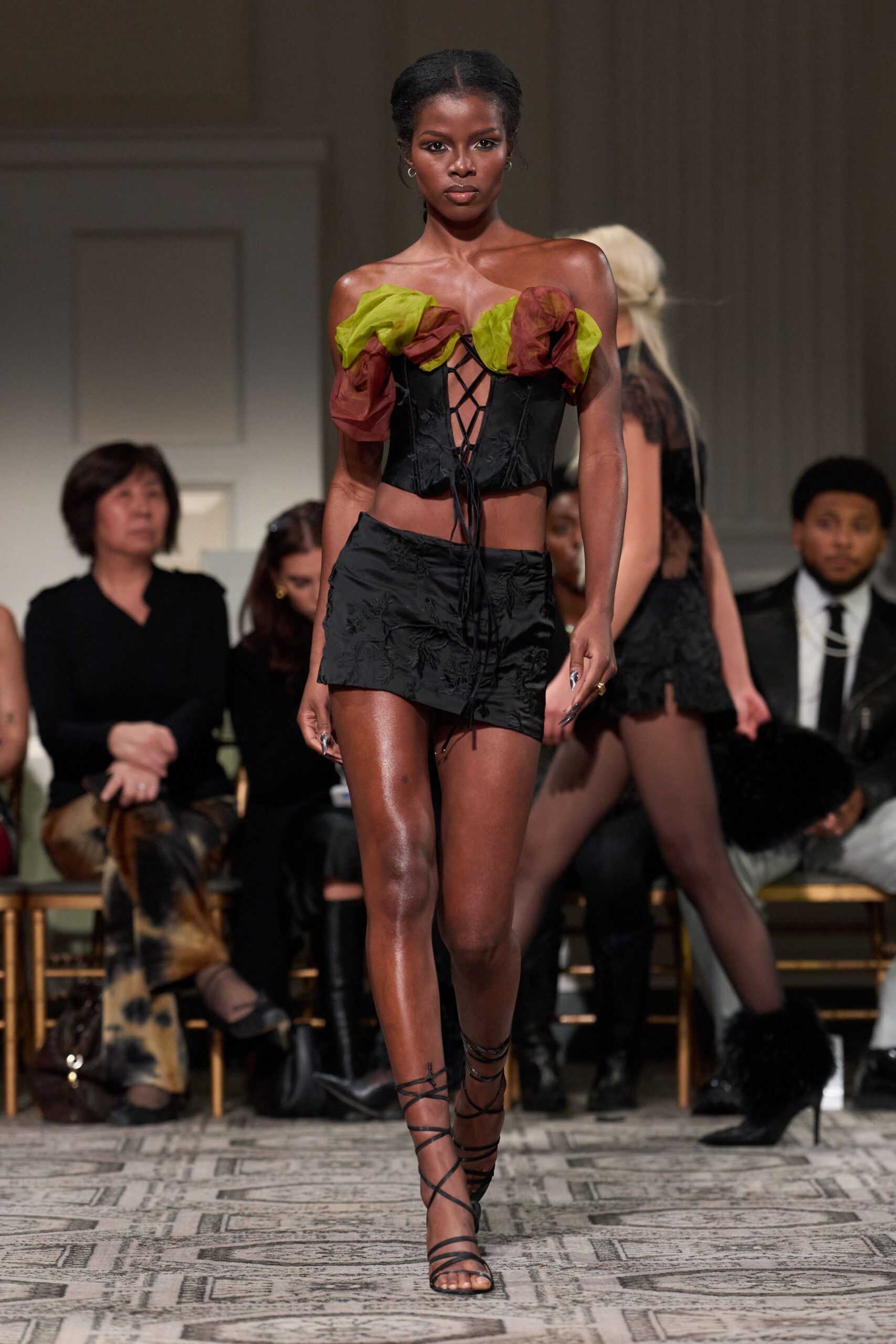 black silk ruffled top and mini skirt