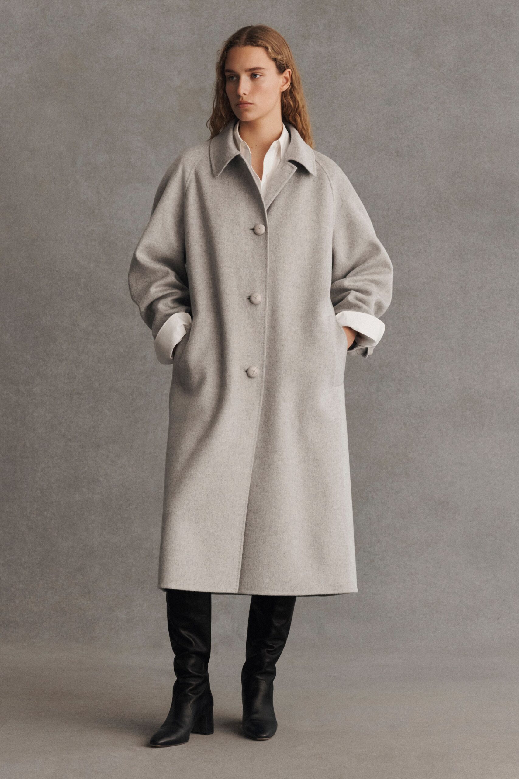 gray wool coat with black boots