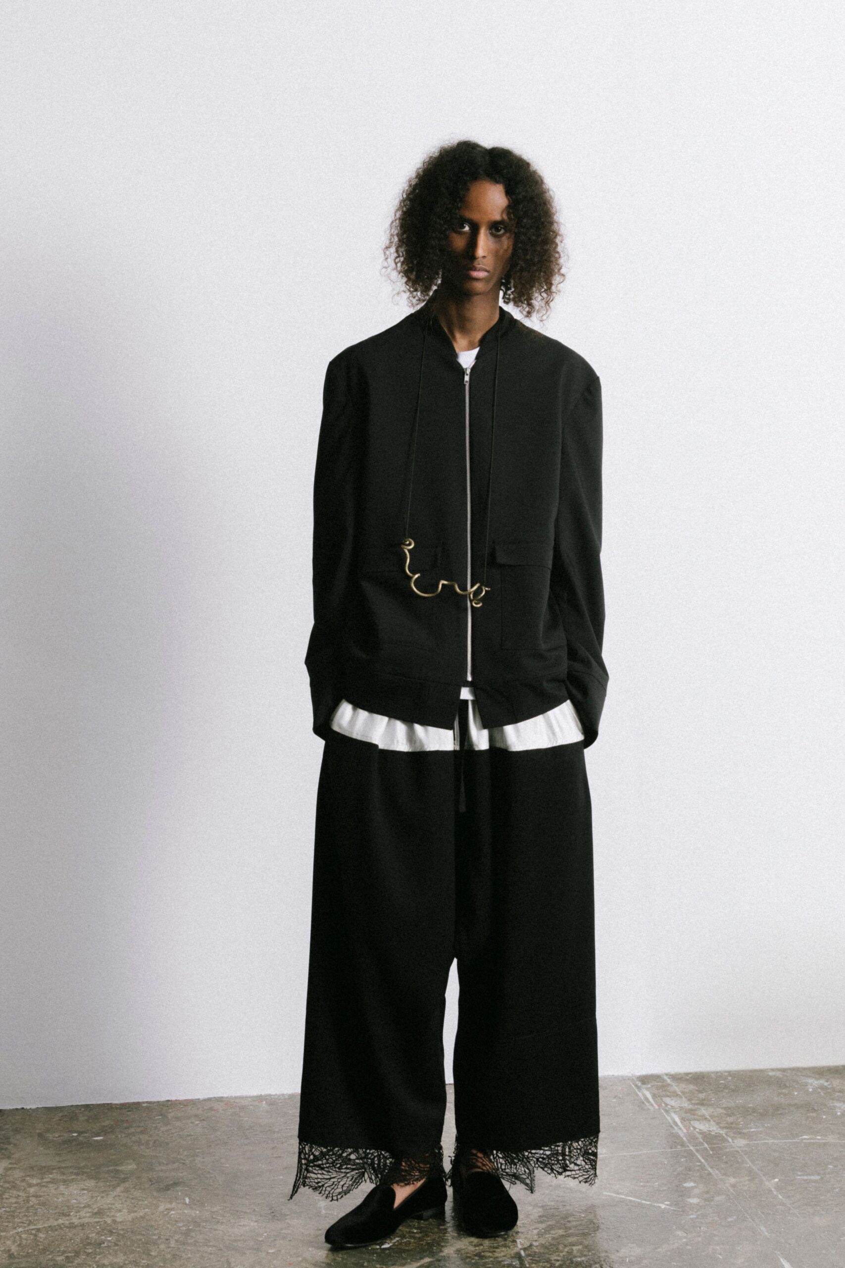 black relaxed jacket with white shirt