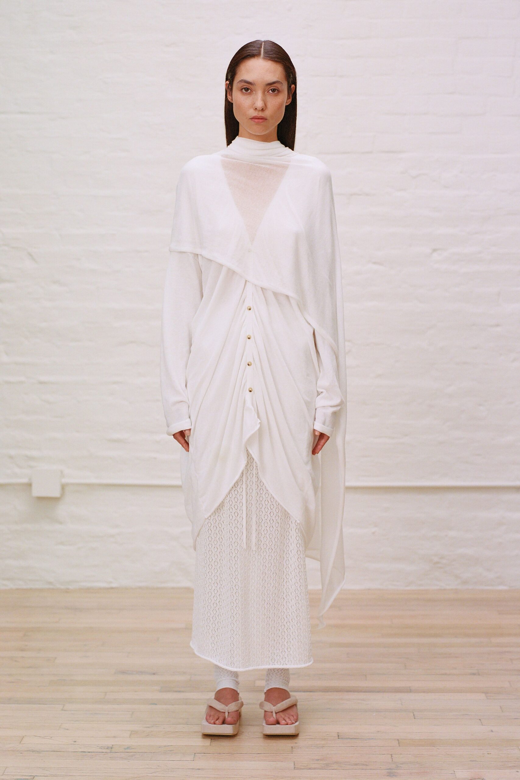 white cotton long-sleeve high-neck fitted draped buttoned dress