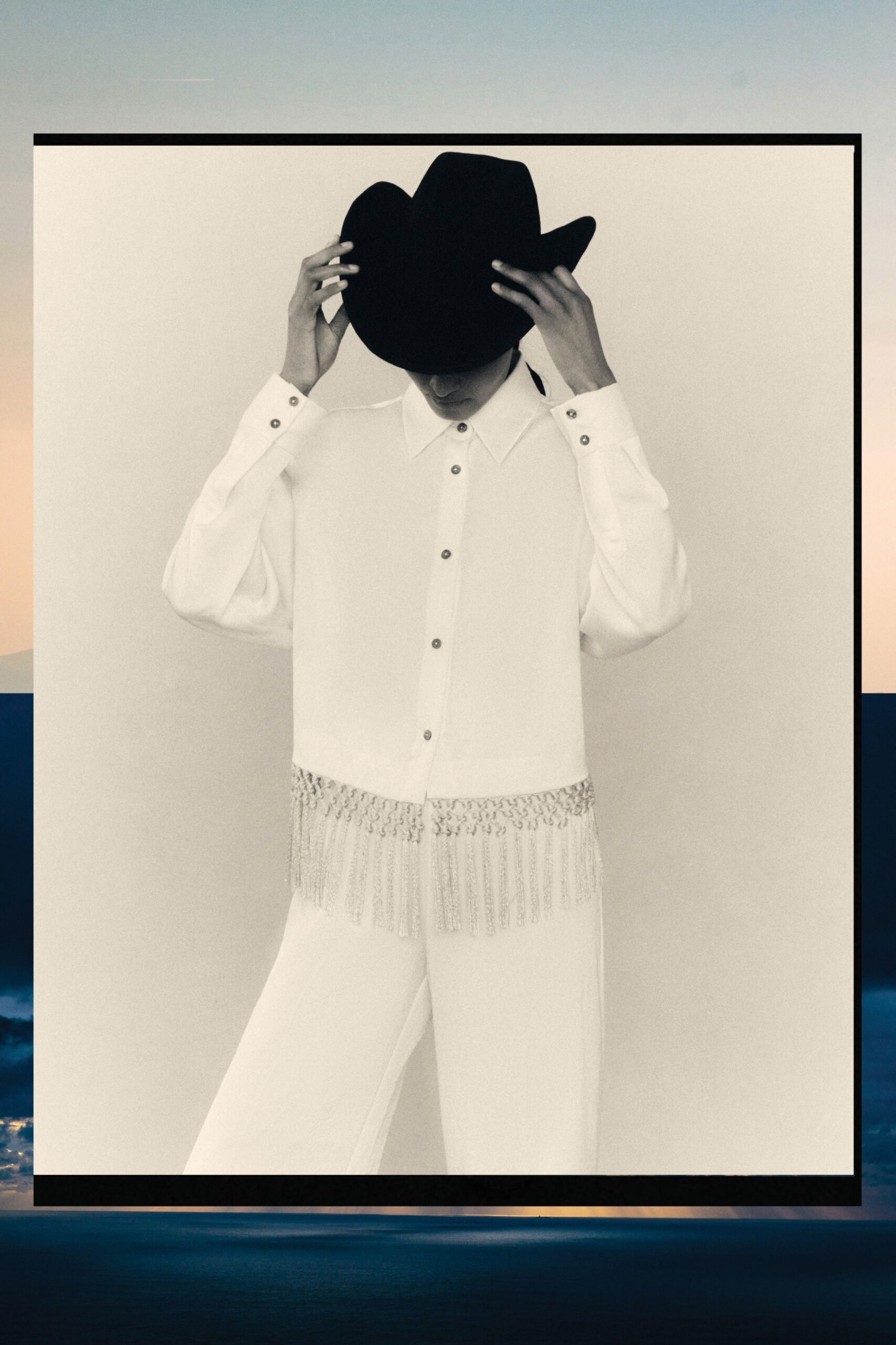 white cotton long-sleeve collared relaxed fringed shirt